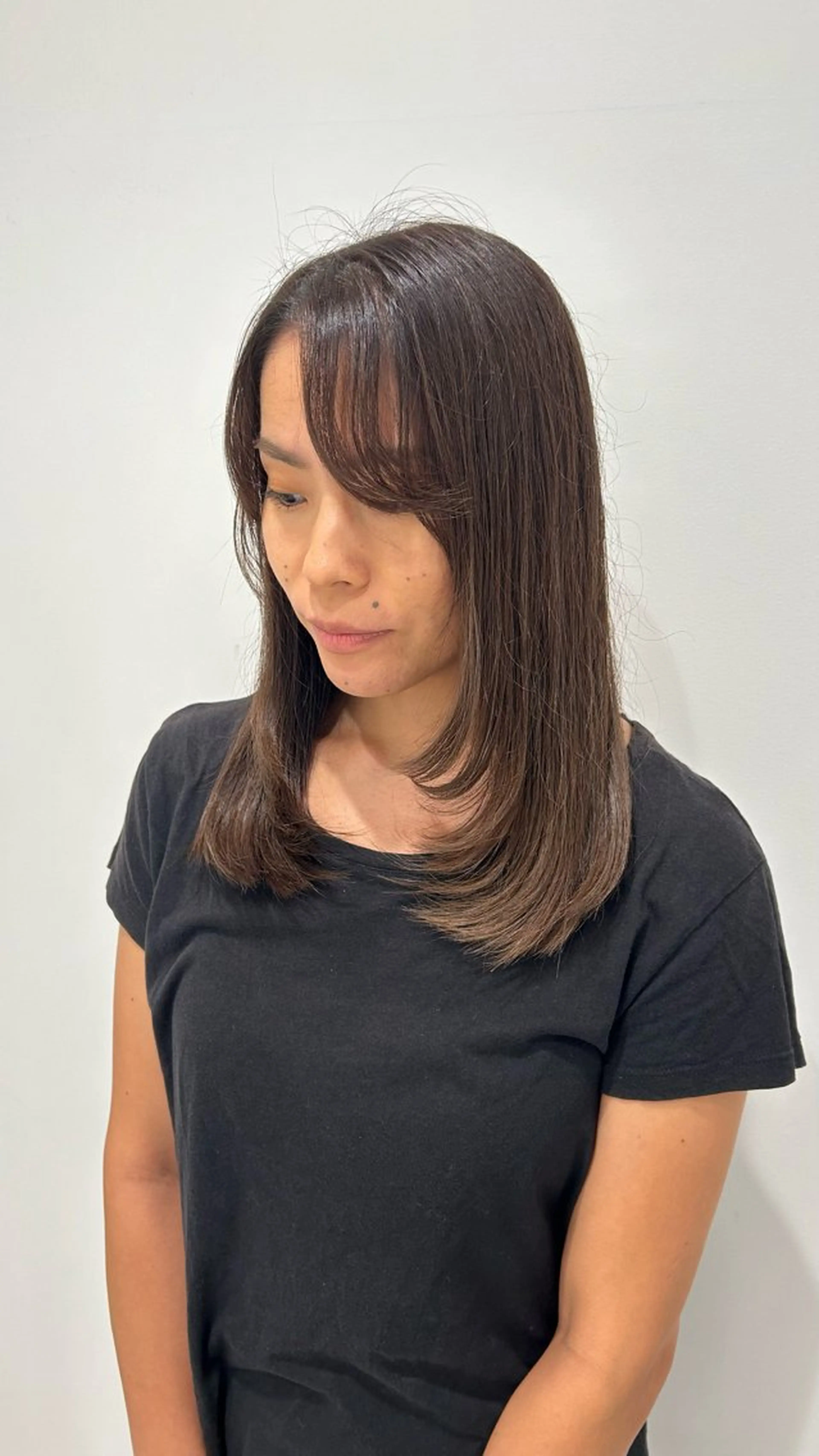 ミディアム レイヤー・ナチュラル RUKUのヘアスタイル