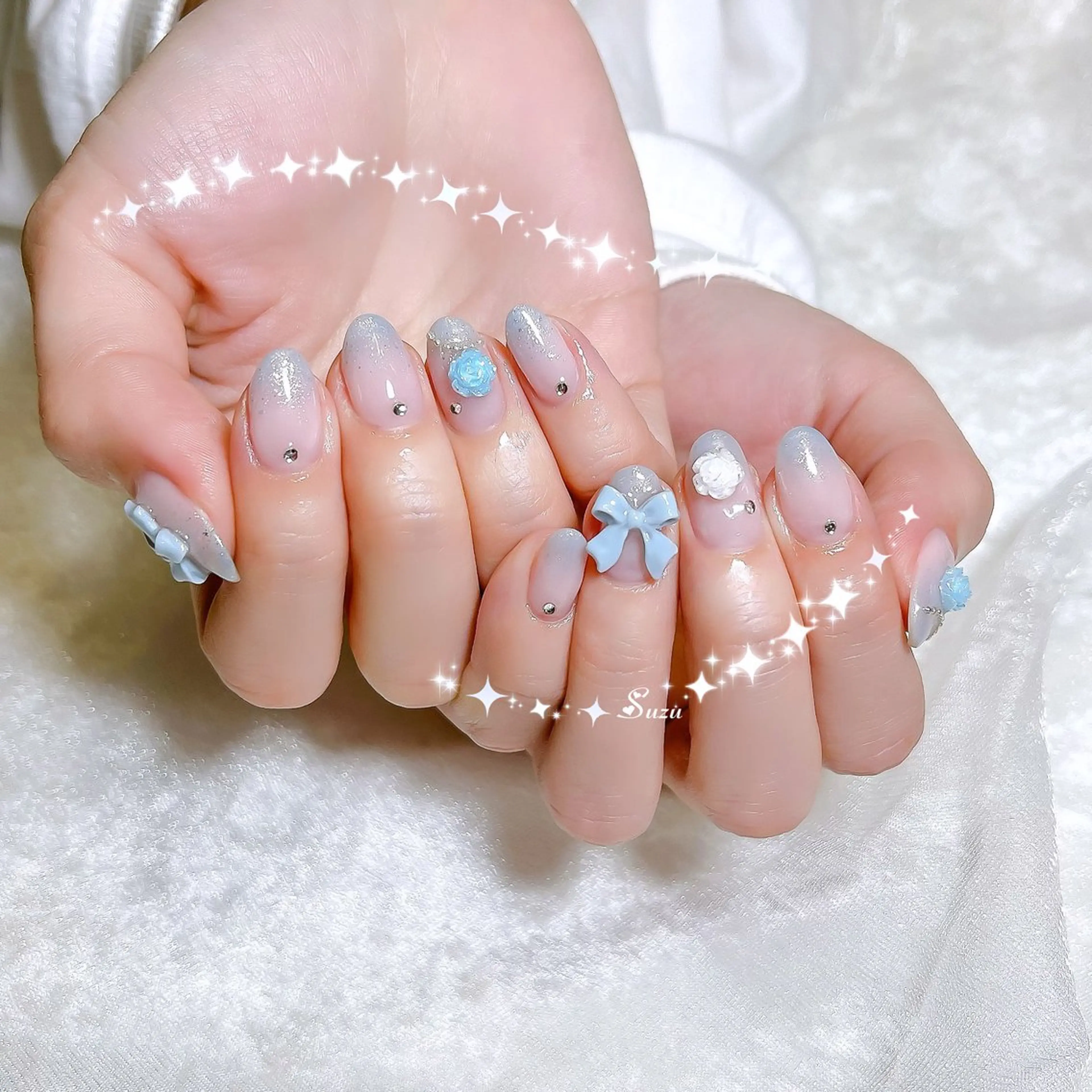 【24歳以下限定・オフなし】おまかせ水色ネイル🩵の写真