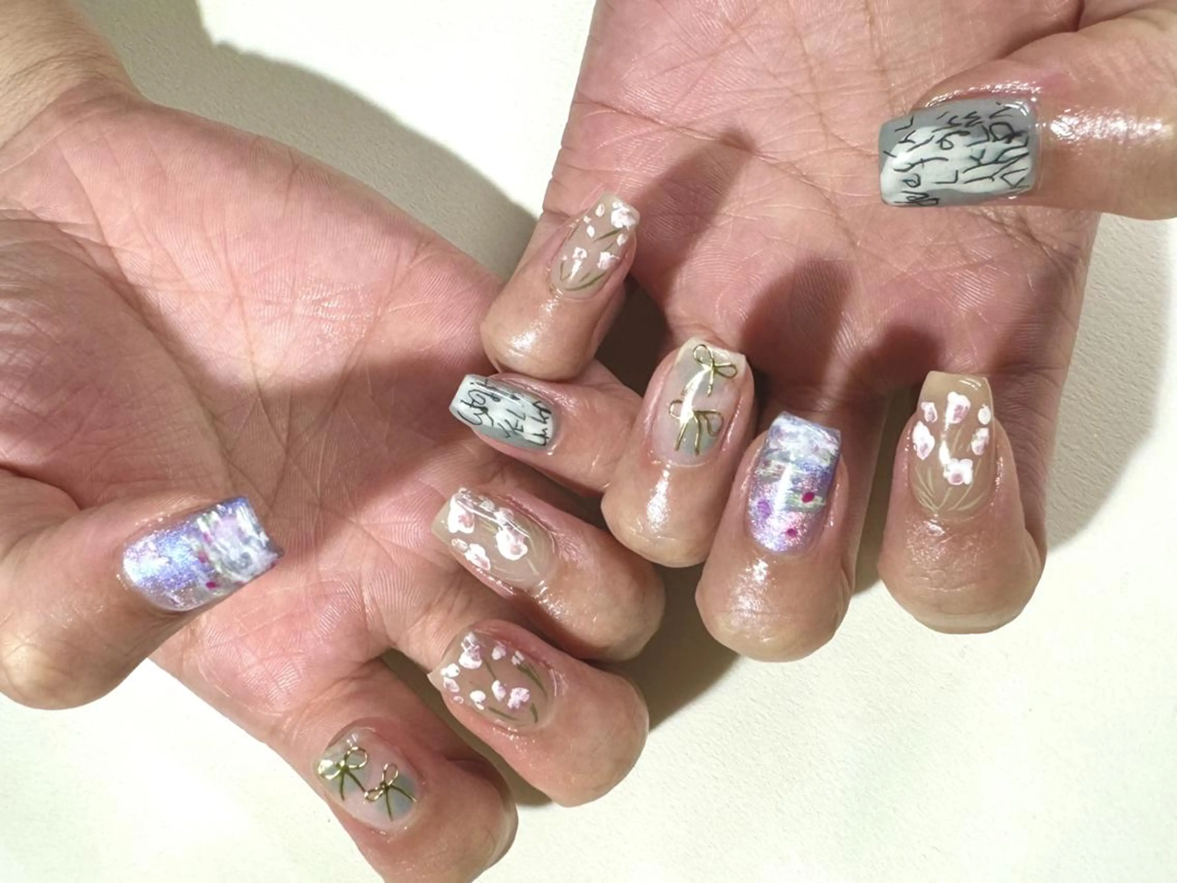 ネイル フラワーネイル ジェルネイル 韓国ネイル ニュアンスネイル リボン nailstudio eviz新宿店のネイルデザイン