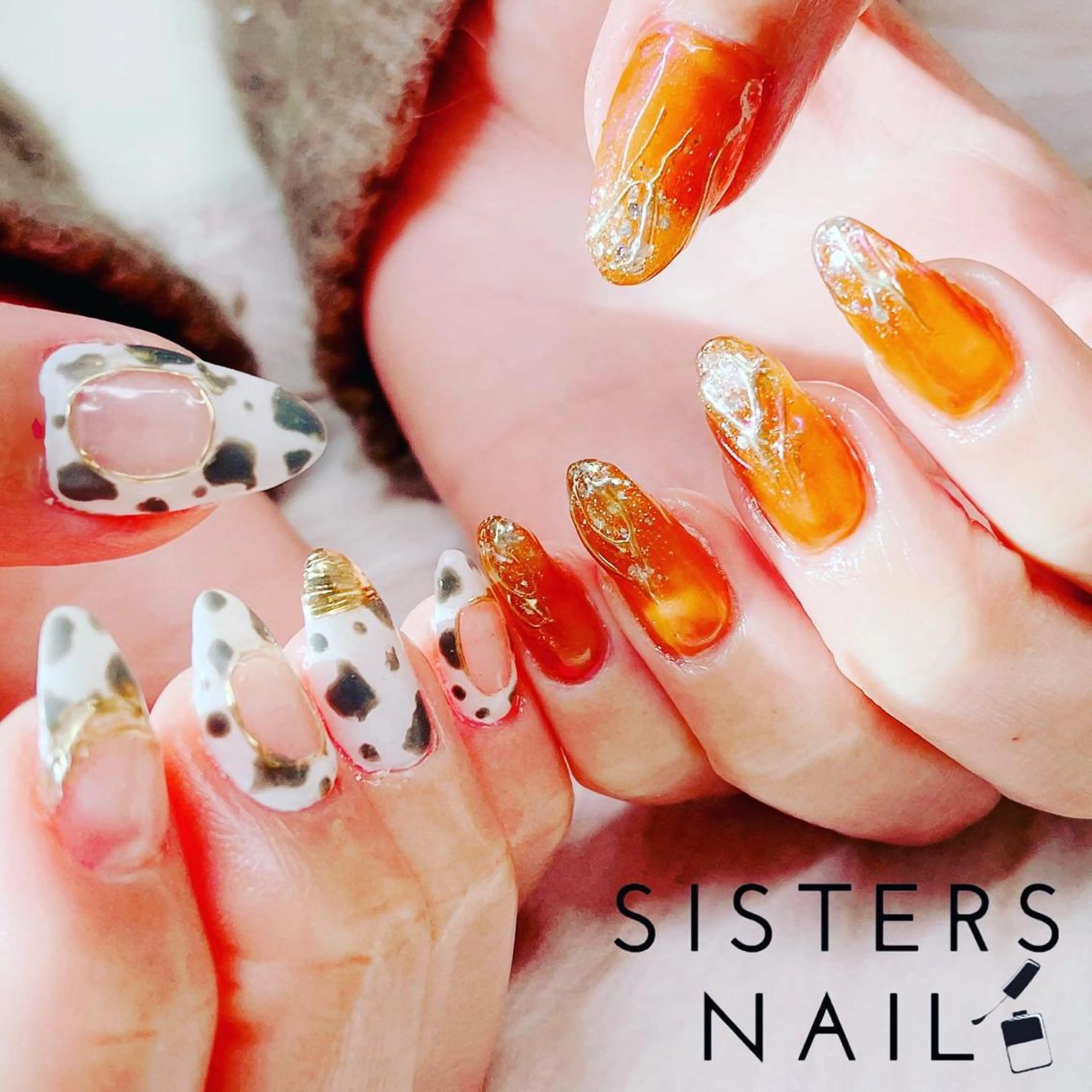 ネイル アートネイル ミラーネイル ニュアンスネイル オレンジ 春ネイル ハンドネイル ハンドケア sisters nail.fのネイルデザイン