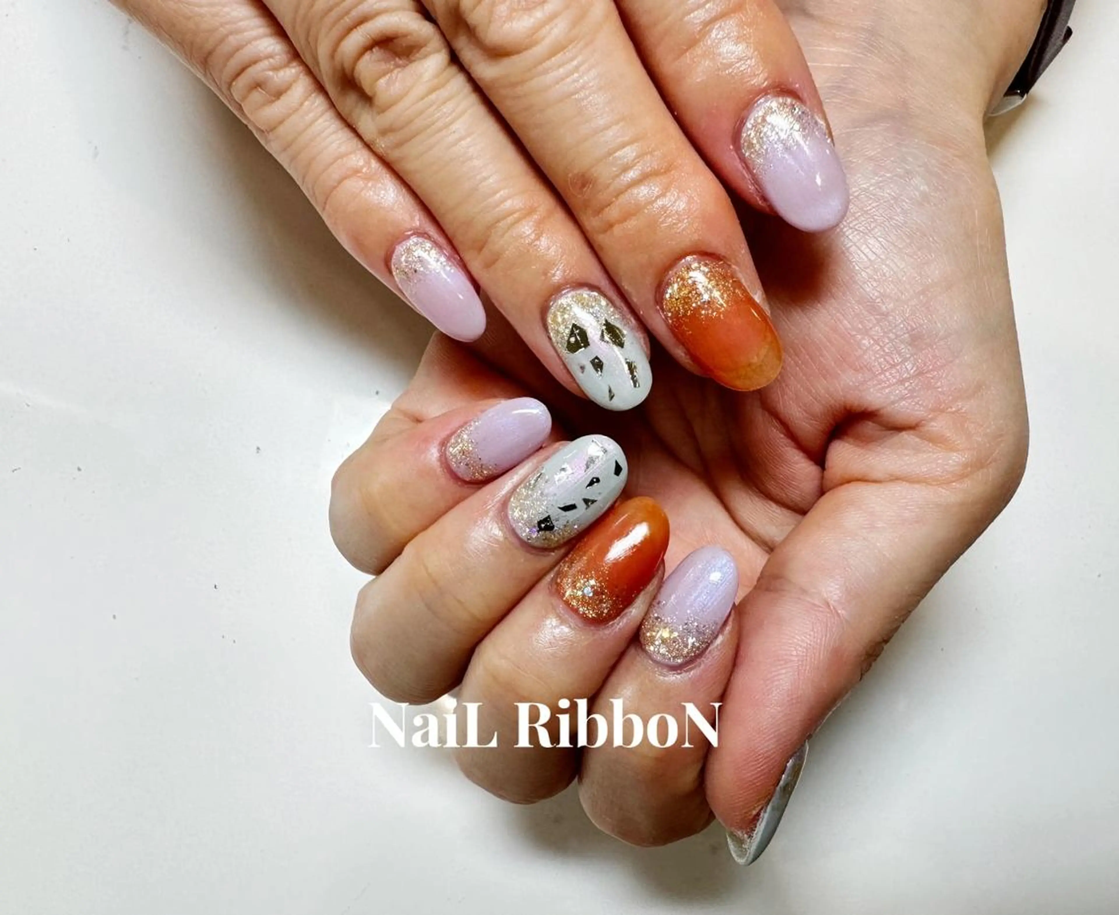 ネイル ネイルリボン 受付スタッフのネイルデザイン