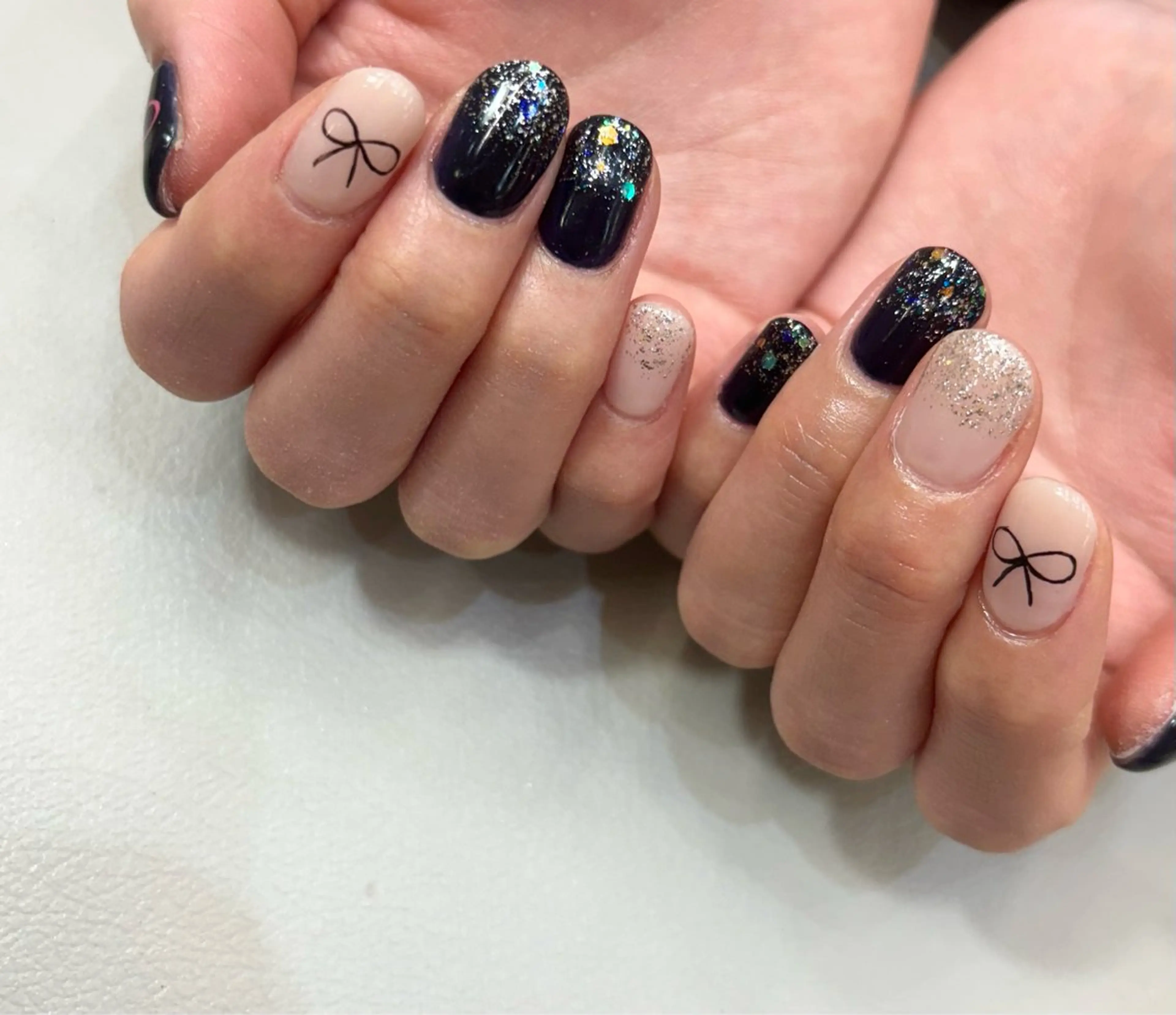 ネイル リボン LovesLaughs下上津役店所属・くろせ れいのネイルデザイン