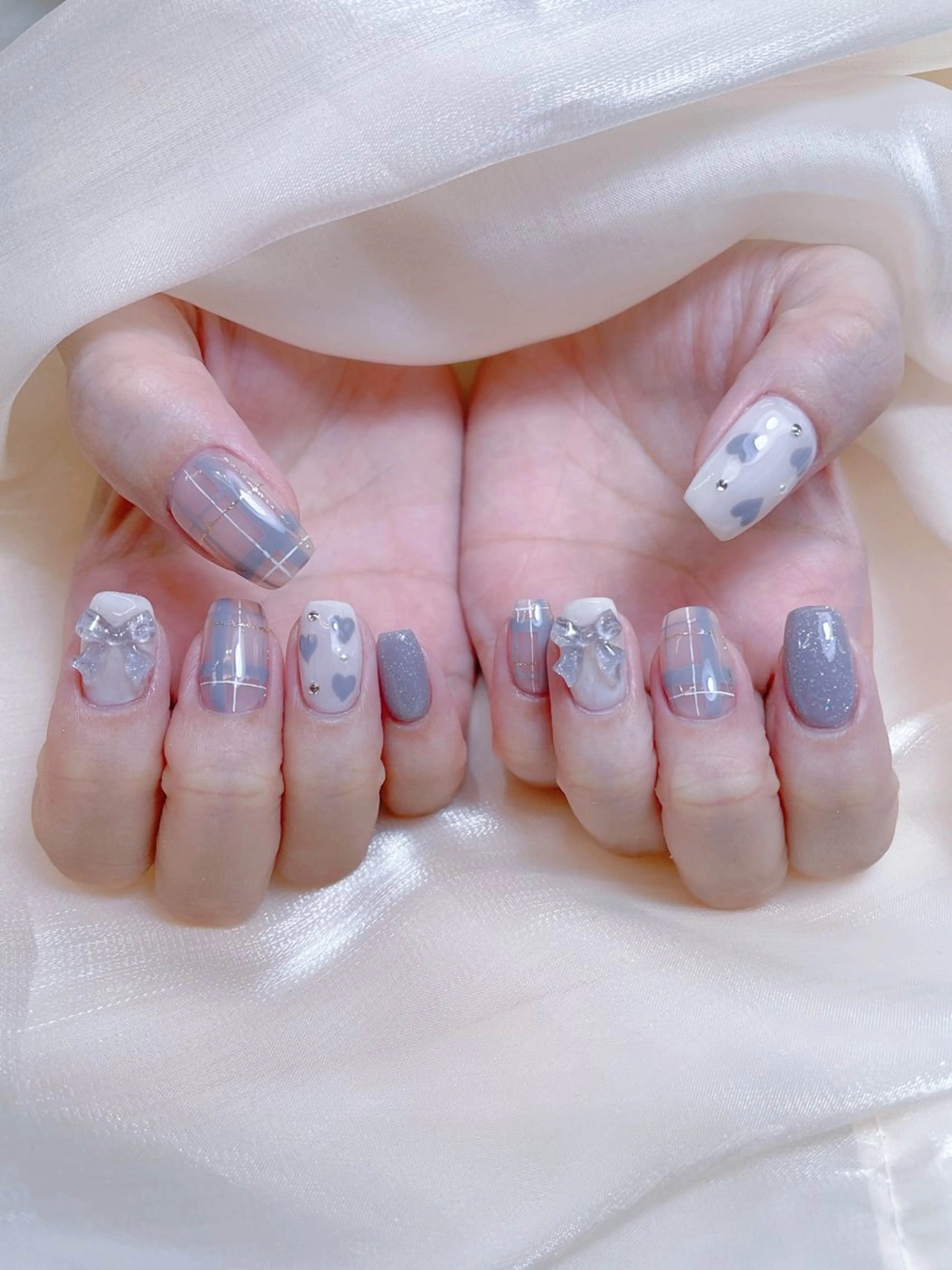 ネイル チークネイル ガーリー キラキラネイル 韓国ネイル リボン ハンドネイル princess スカルプ専門店のネイルデザイン