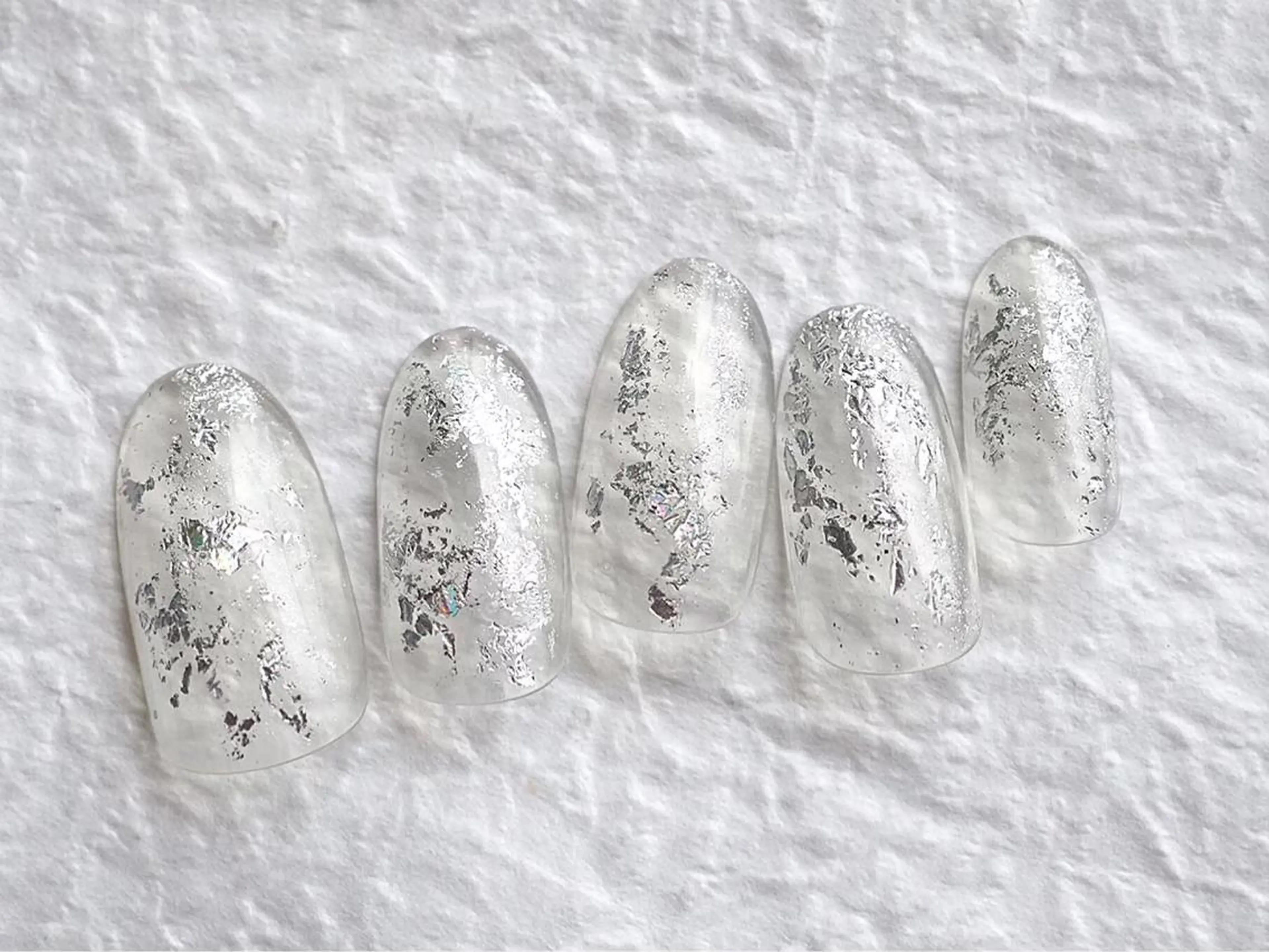 ネイル キラキラネイル ネイルPetit Ribbonのネイルデザイン