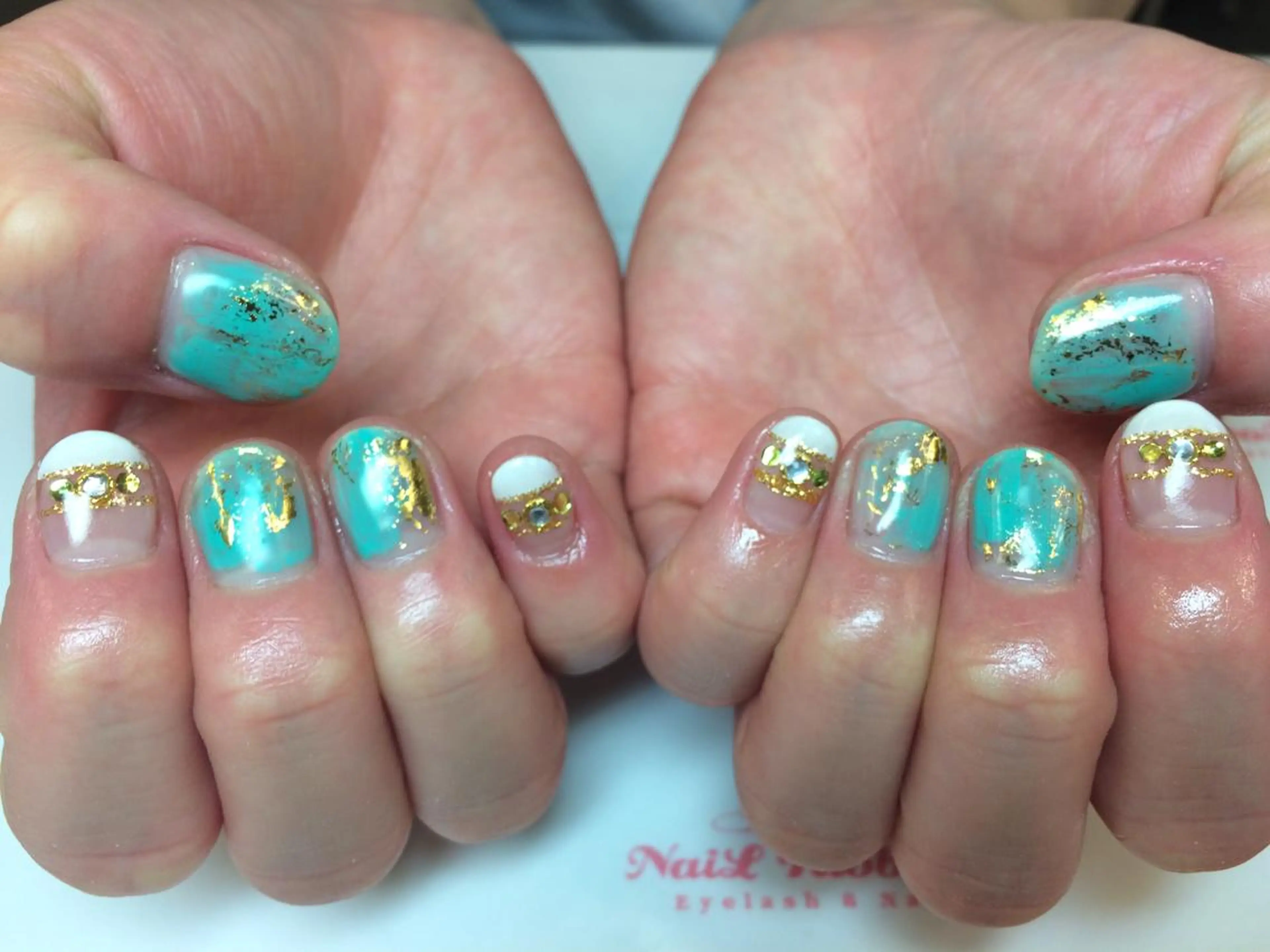 ネイル ネイルリボン 受付スタッフのネイルデザイン