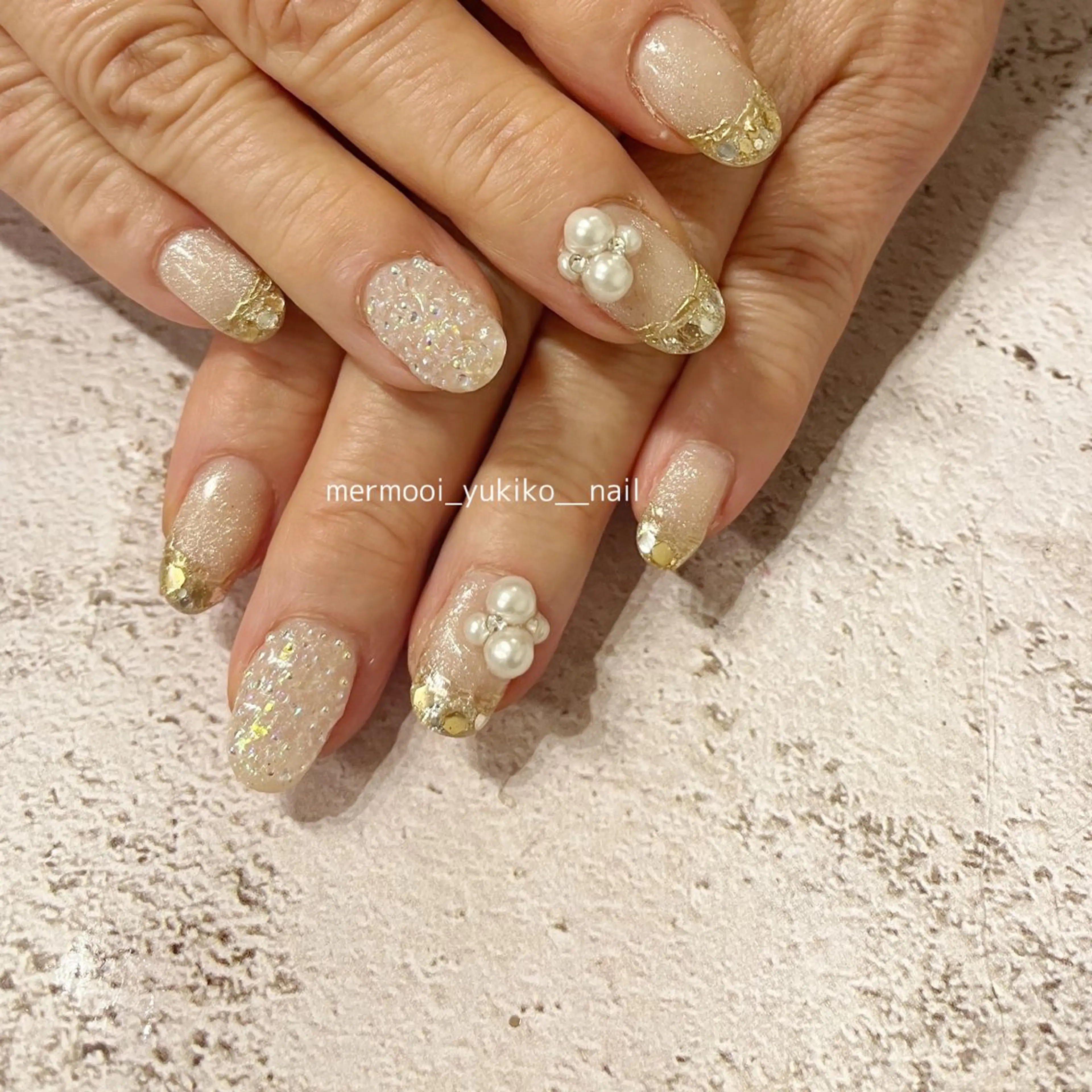 ネイル フレンチネイル ジェルネイル ガラスフレンチ ゴールド キラキラネイル ハンドネイル melu所属・melu yukikoのネイルデザイン