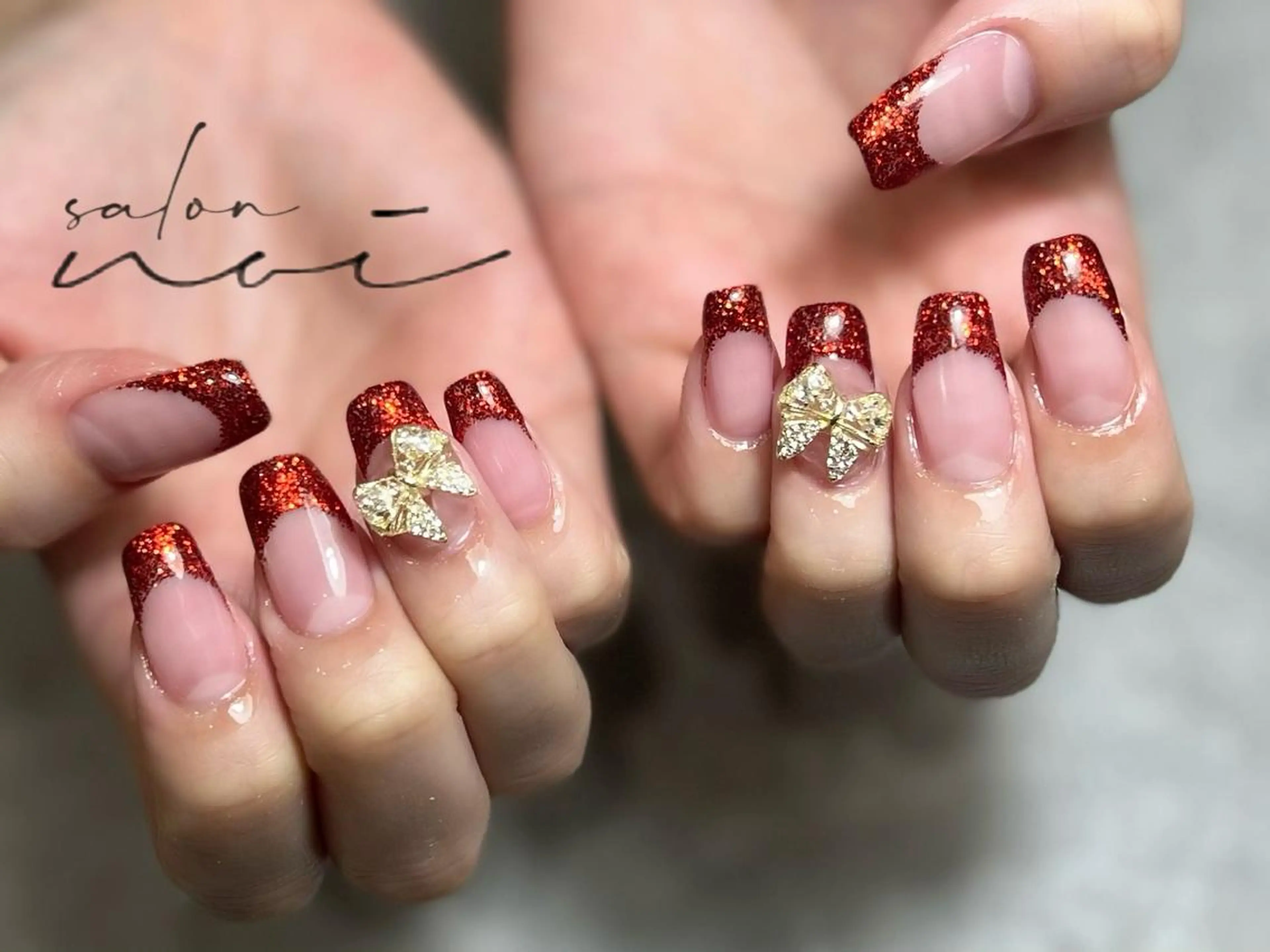 ネイル フレンチネイル 赤色 リボン ハンドネイル salon noi所属・salon noiのネイルデザイン