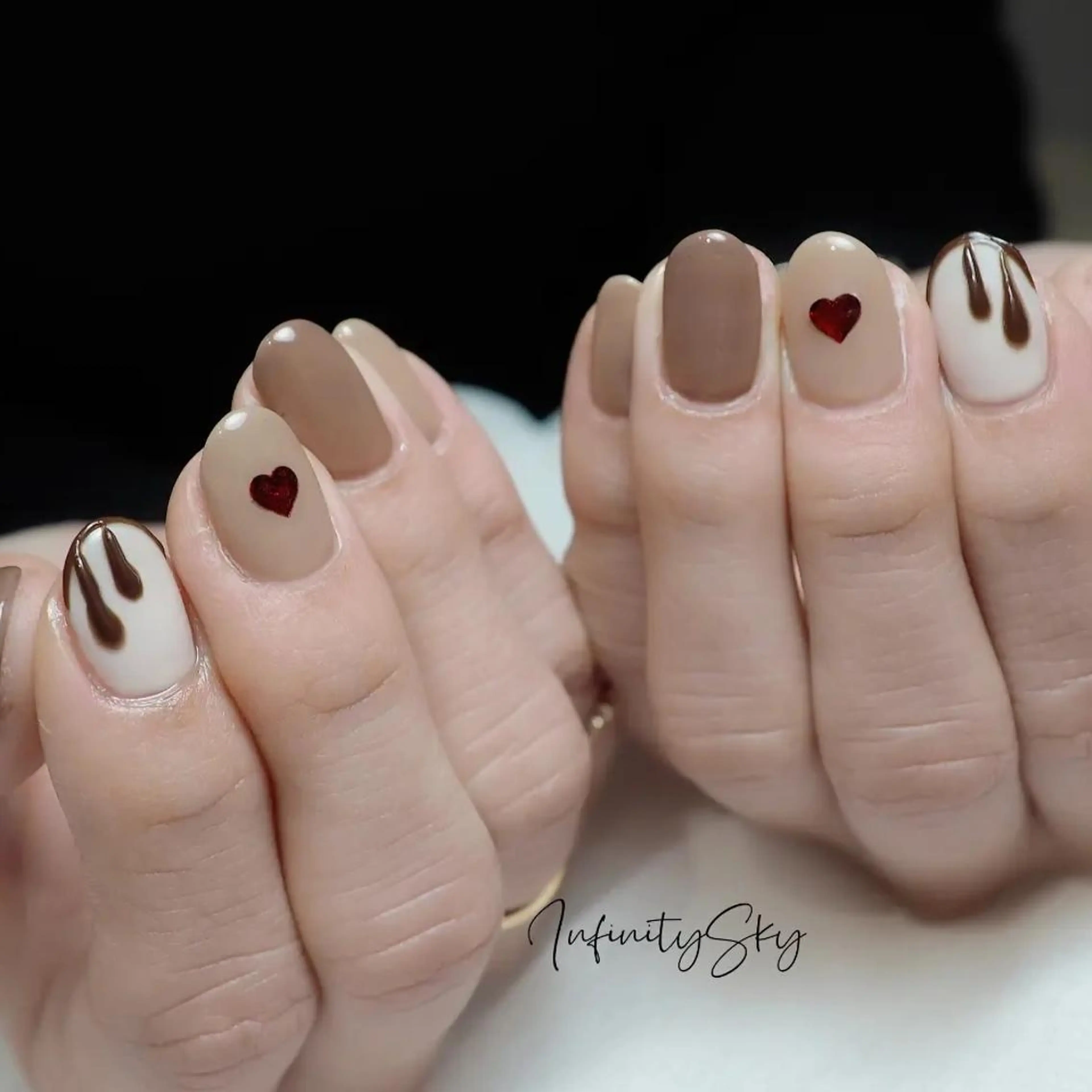 ネイル ブラウン バレンタイン infinity skyのネイルデザイン