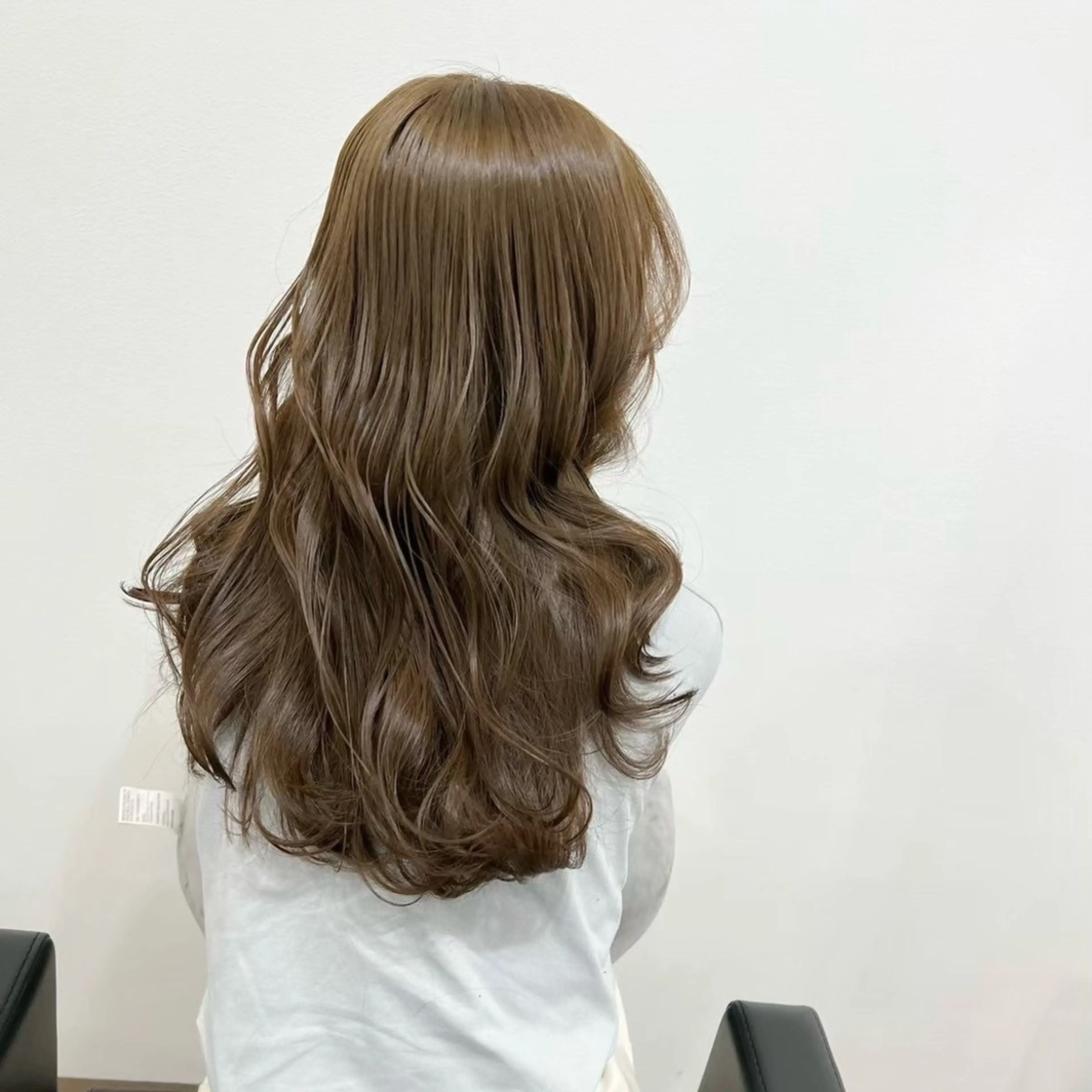 ロング 岡田 佳子のヘアスタイル