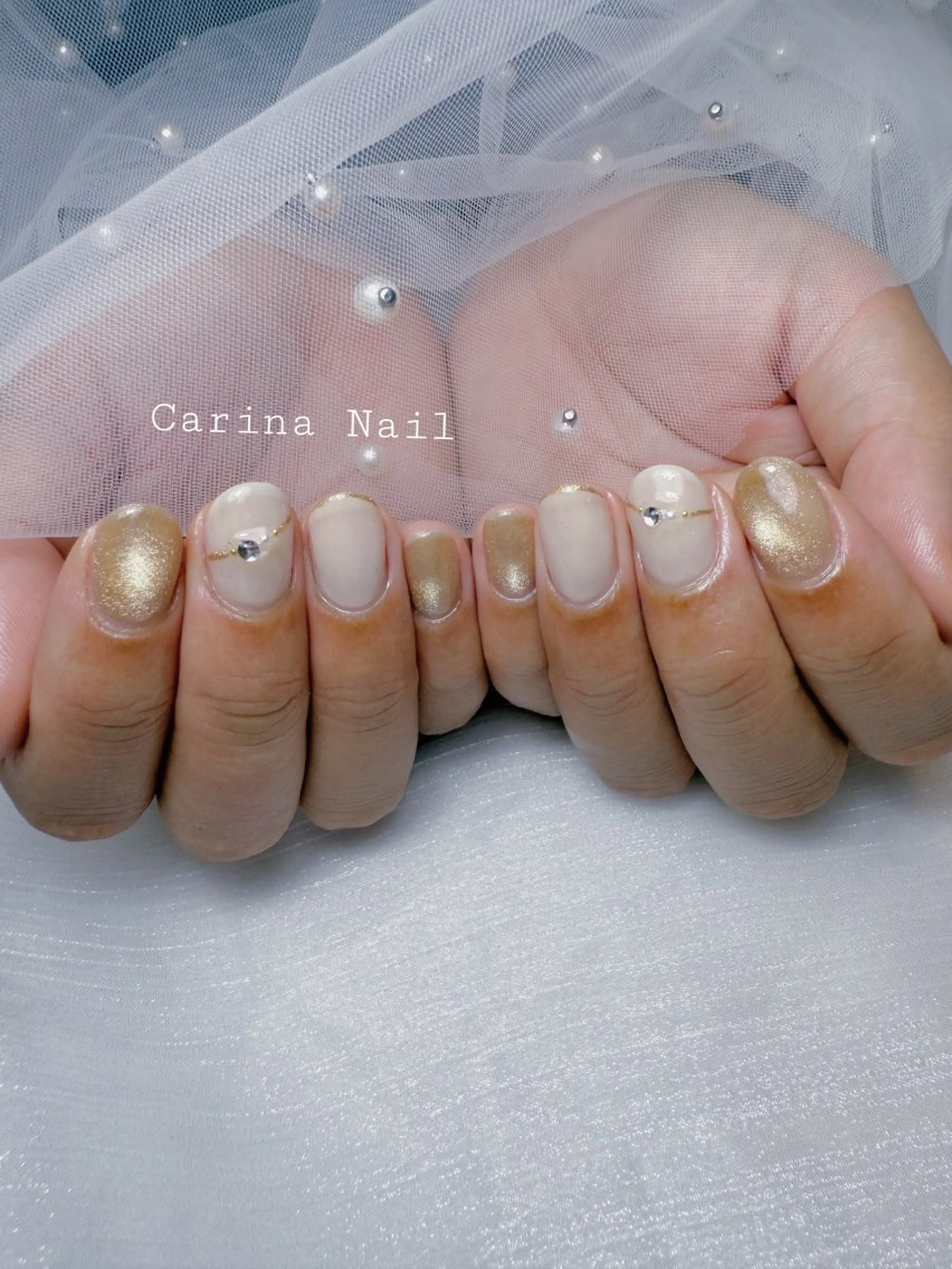 ネイル ゴールド ストーンネイル Carina Nail所属・Carina Nailのネイルデザイン