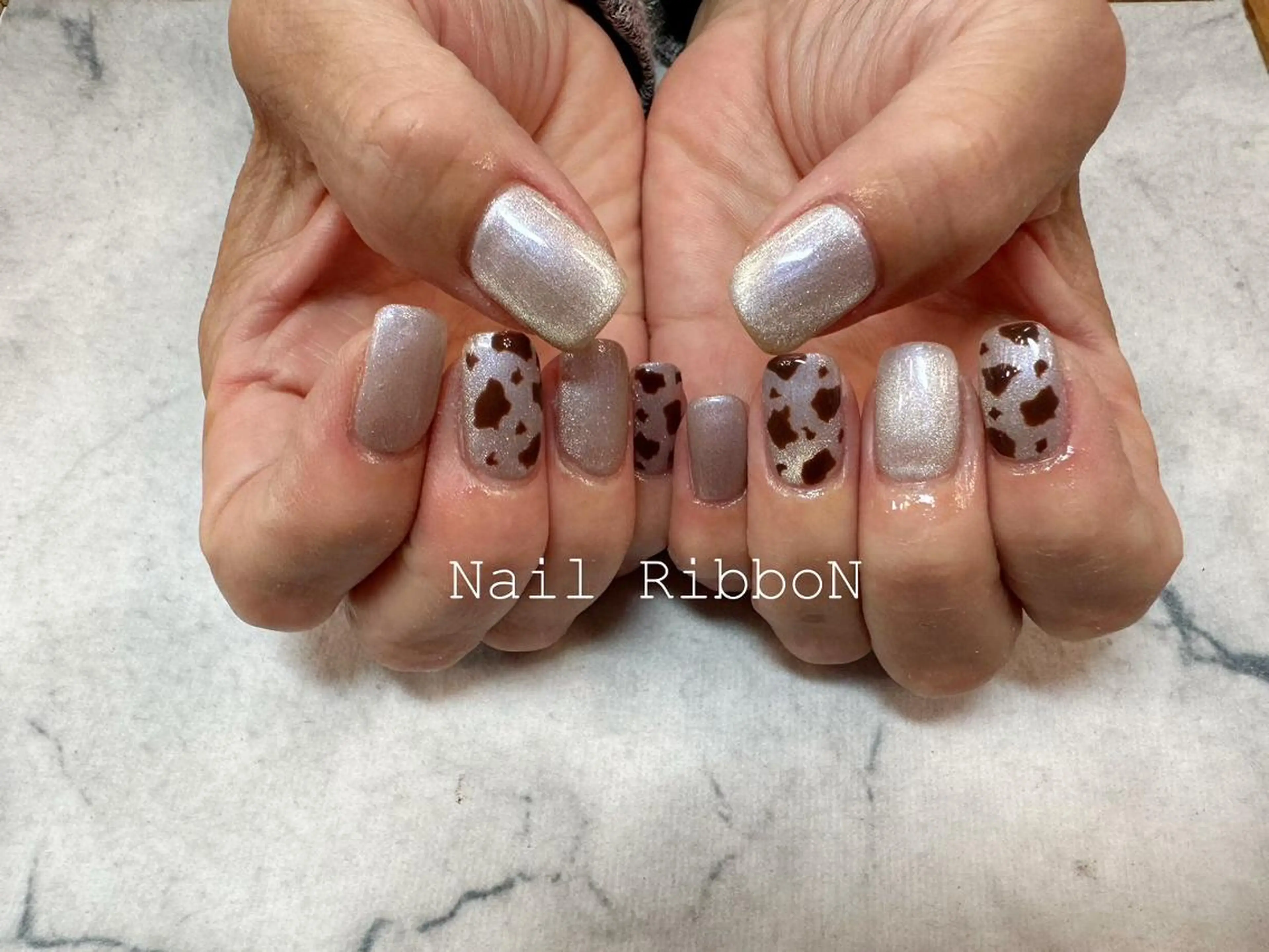 ネイル ネイルリボン 受付スタッフのネイルデザイン