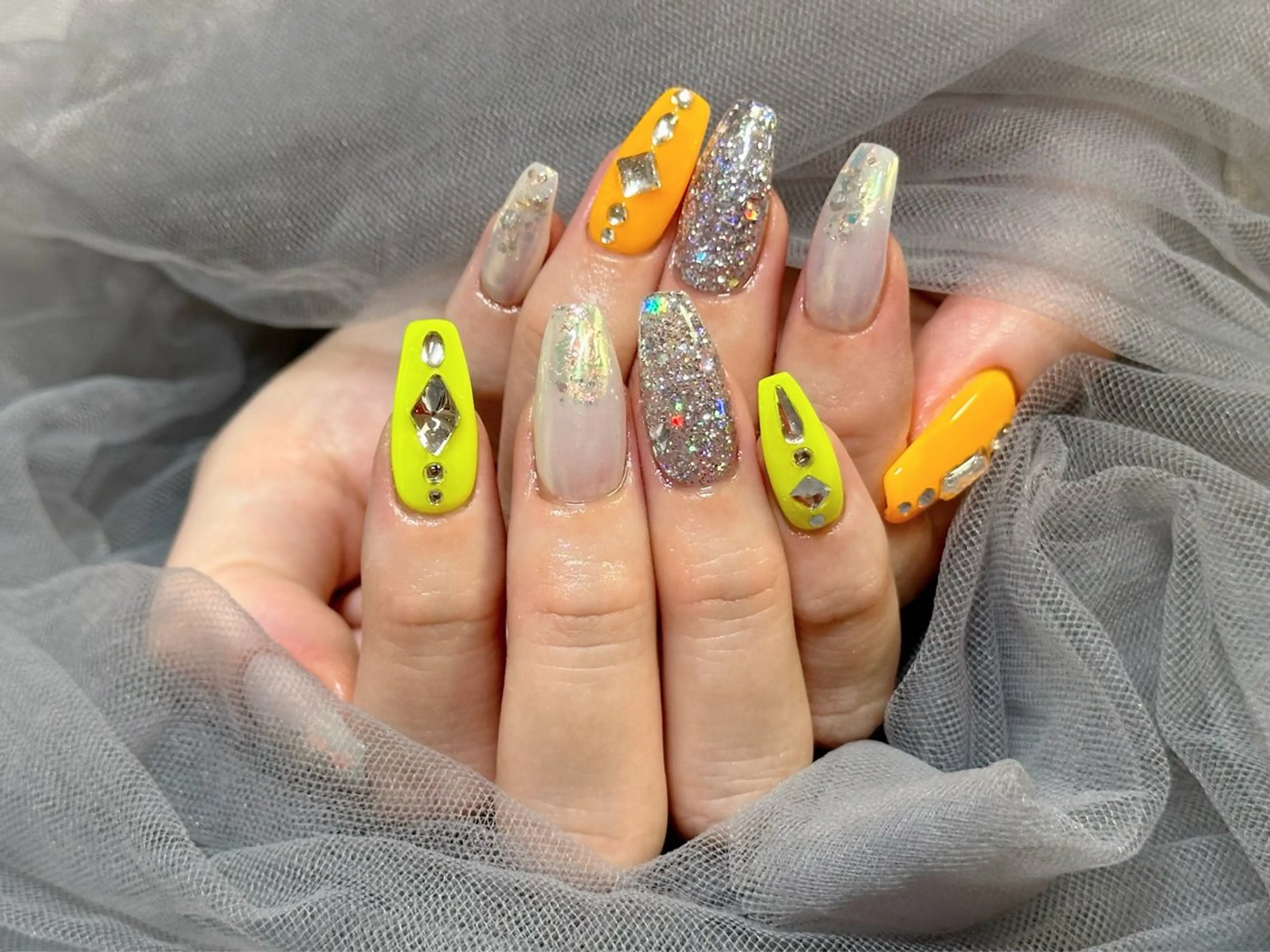 ネイル オレンジ 黄色 ハンドネイル KURELLY所属・Nail Salon KURELLYのネイルデザイン