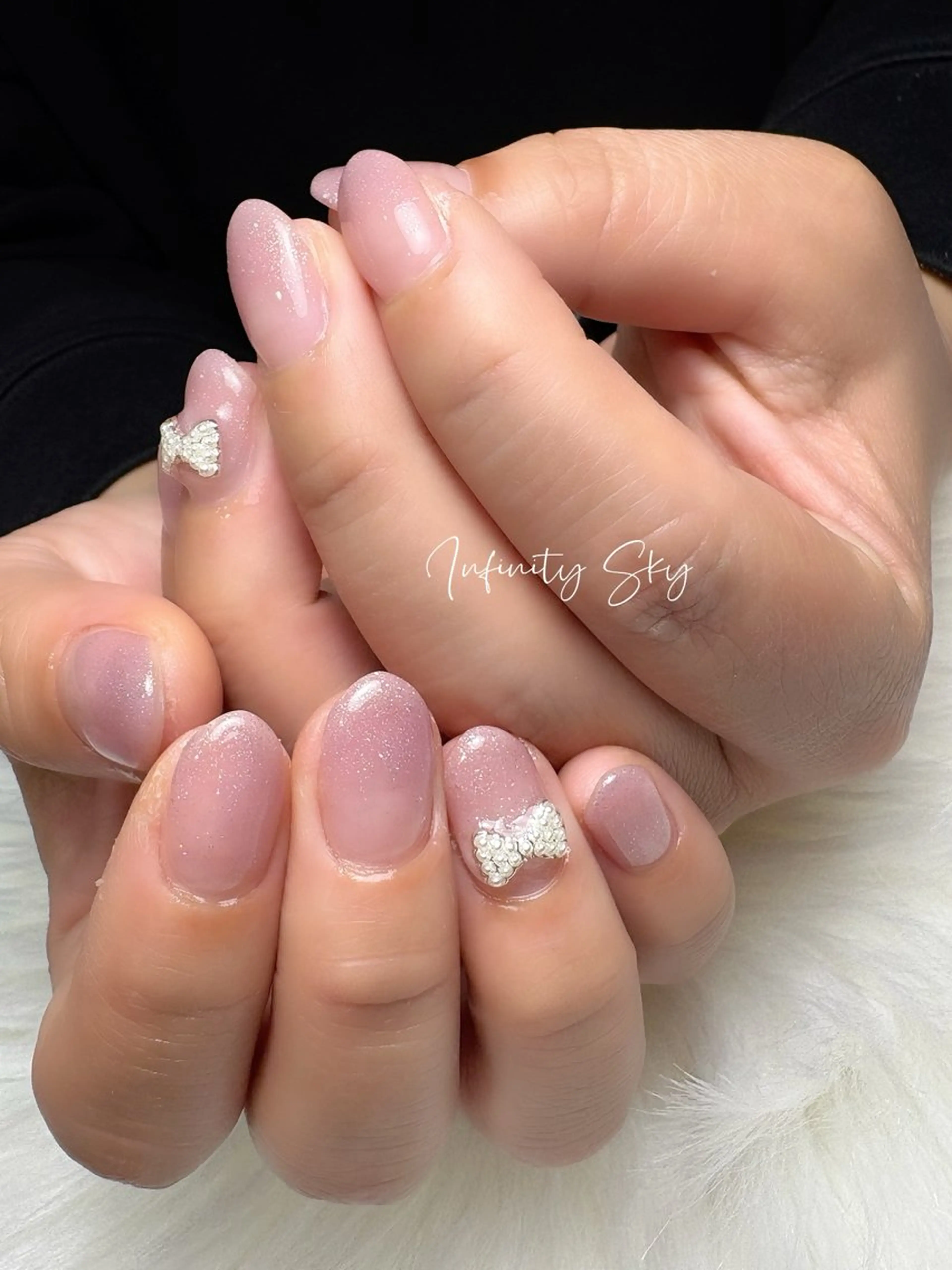 ネイル ラメ(グリッター) ラメグラデーション ピンク リボン 春ネイル infinity skyのネイルデザイン