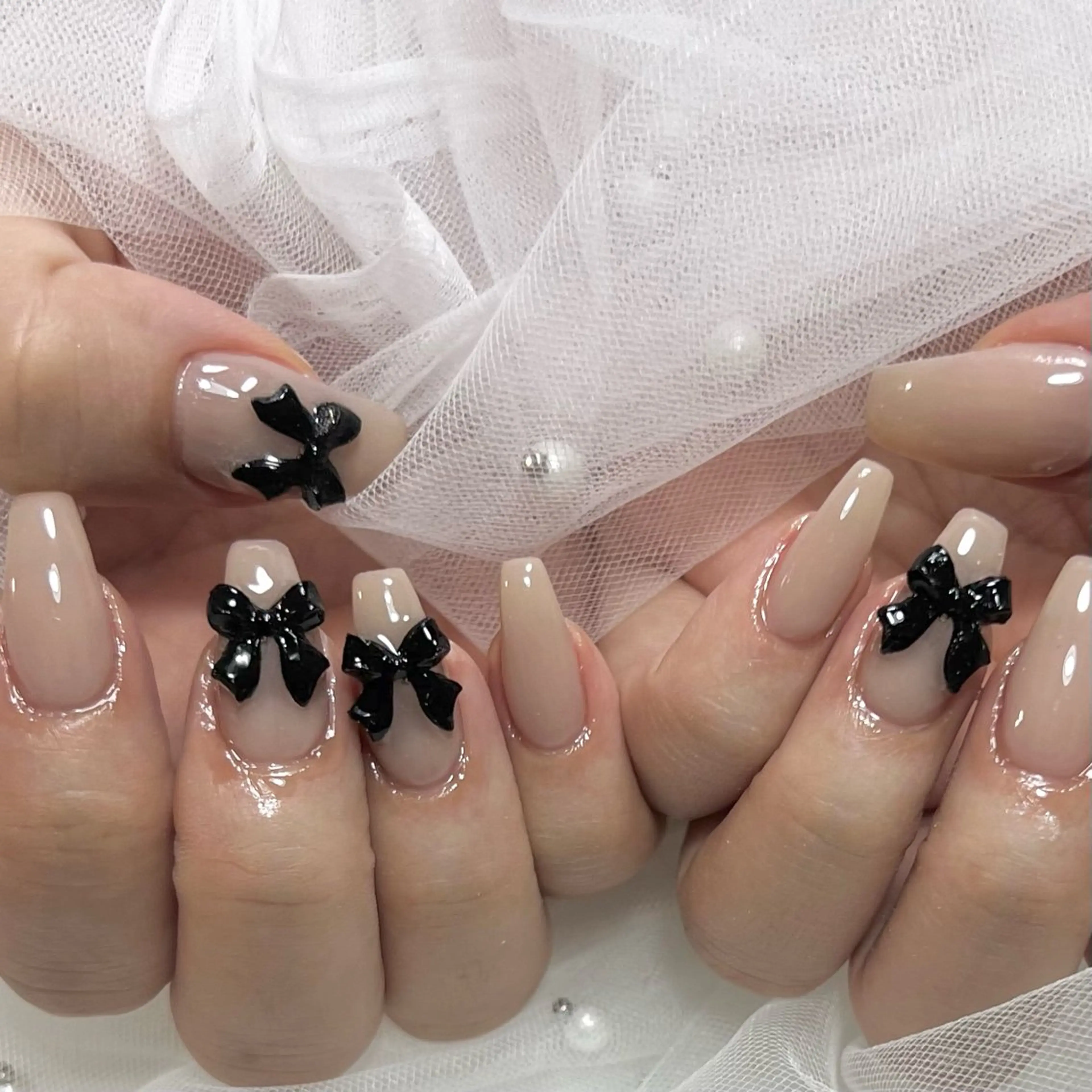 ネイル ワンカラーネイル リボン NANA HARUKAのネイルデザイン