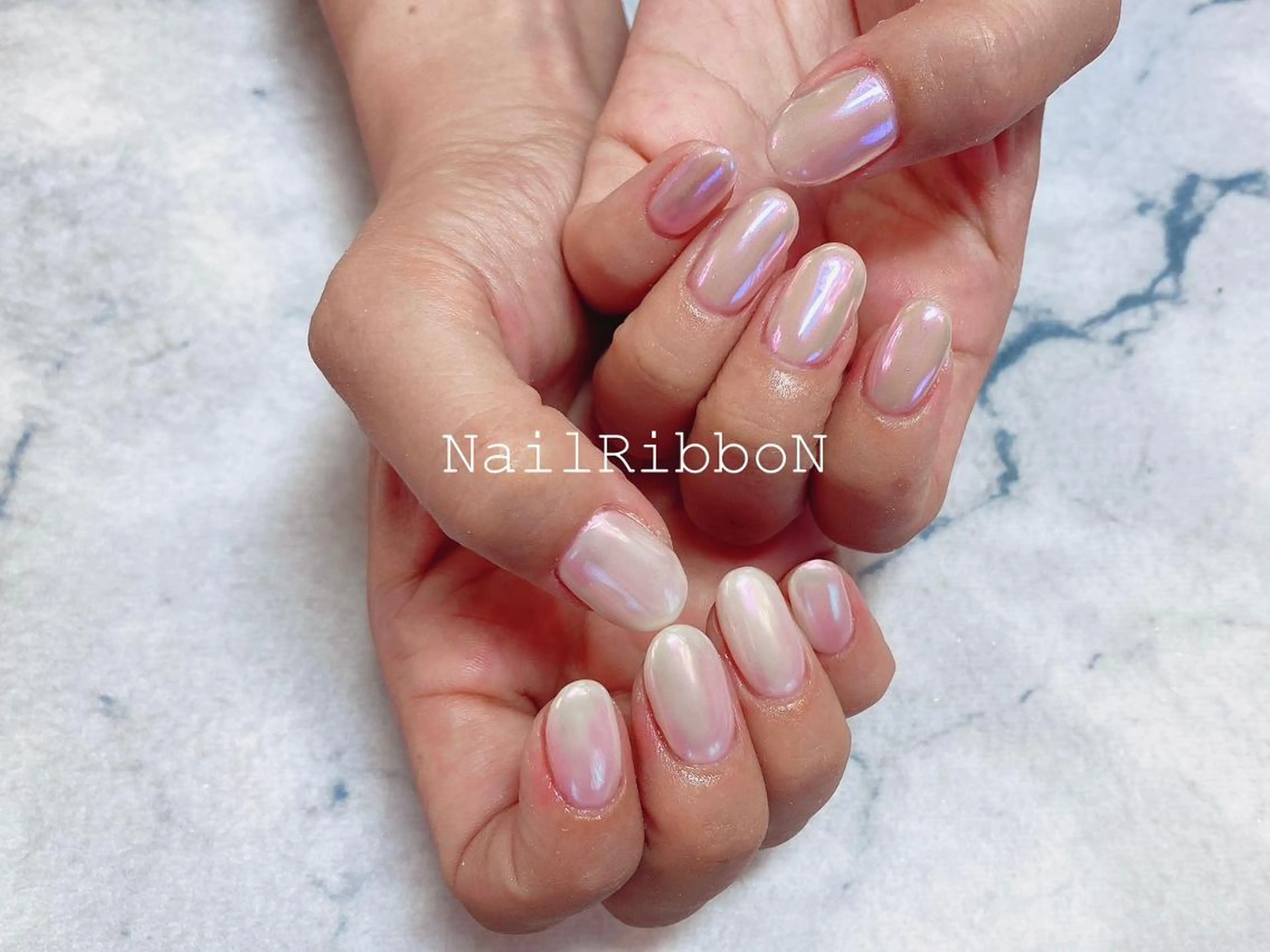 ネイル ネイルリボン 受付スタッフのネイルデザイン