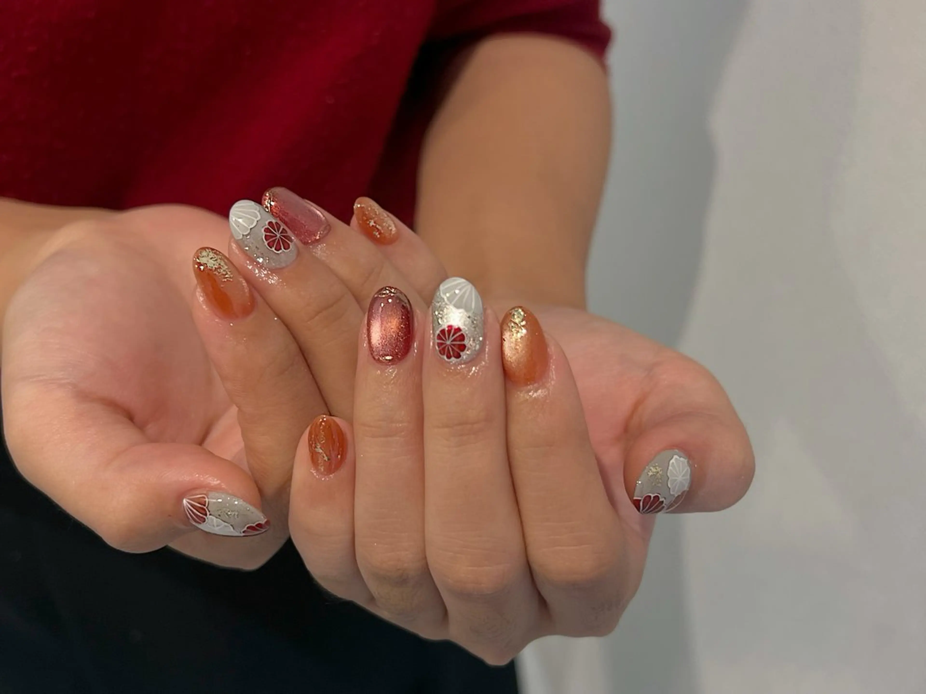 ネイル 成人式 フラワーネイル オレンジ 赤色 Nail salon CELEBRAILのネイルデザイン