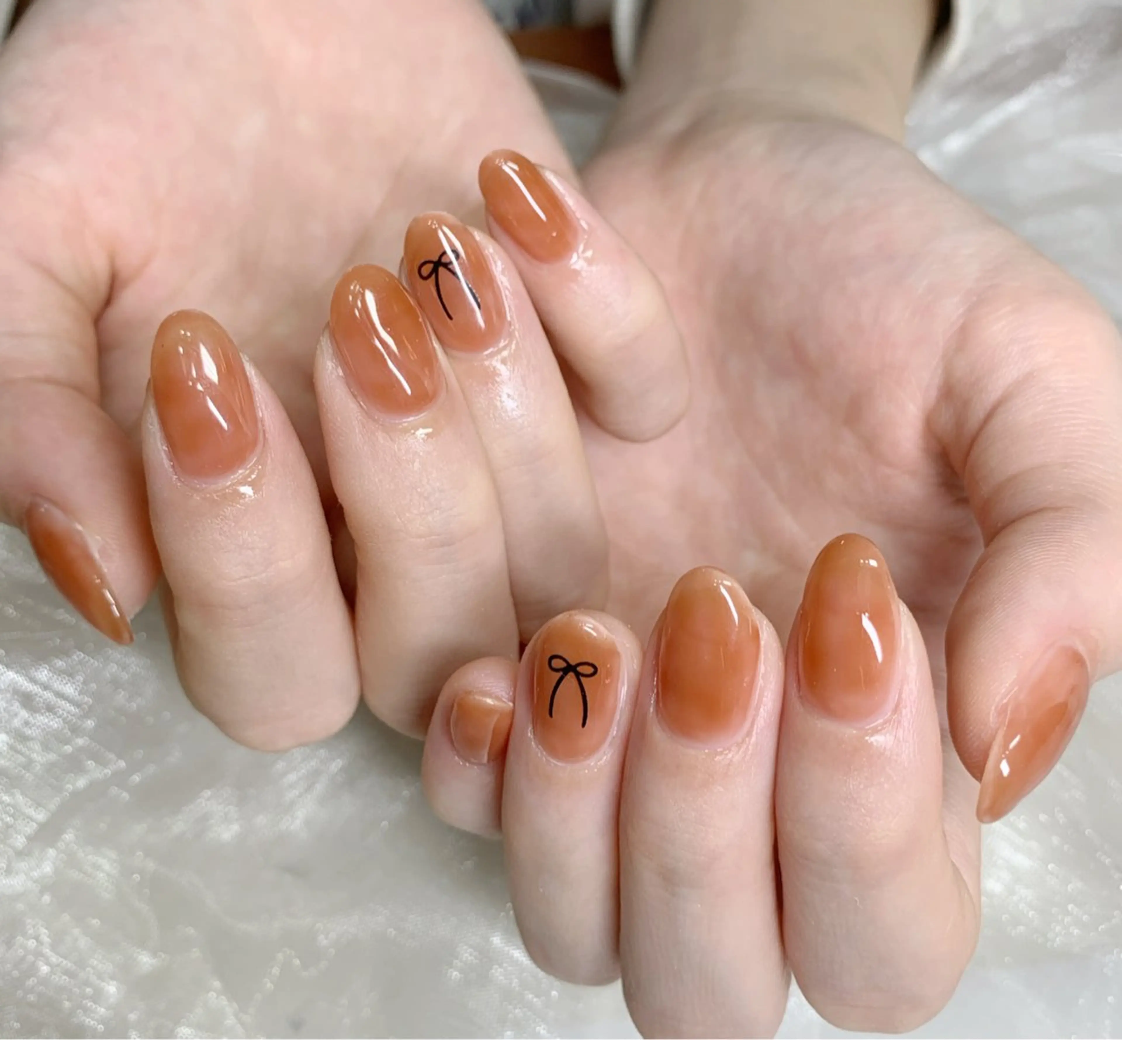 ネイル リボン シンプルネイル 春ネイル 夏ネイル ハンドネイル ハンドケア mira-cle大濱美容アカデミー所属・AI NAのネイルデザイン