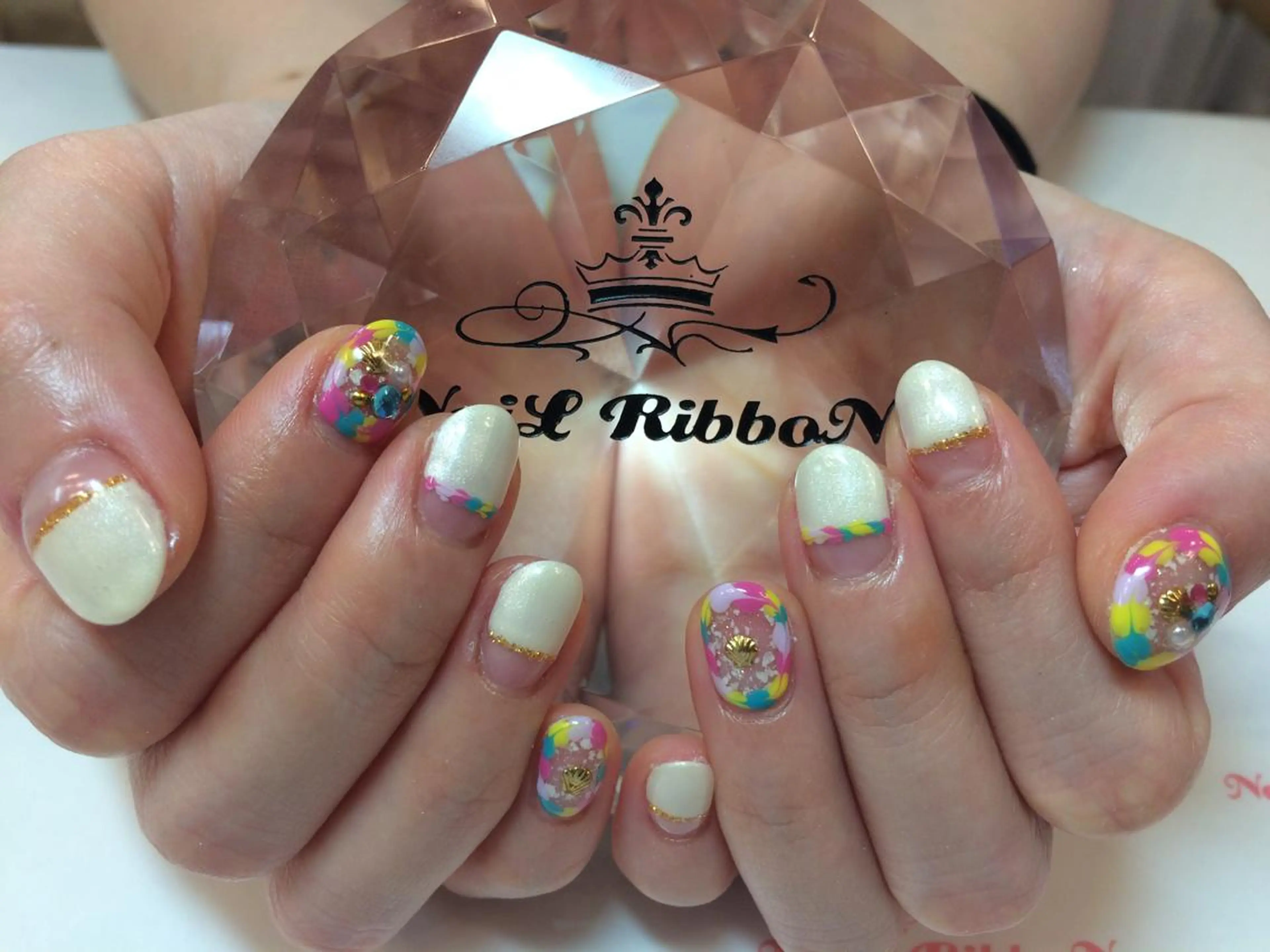 ネイル ネイルリボン 受付スタッフのネイルデザイン