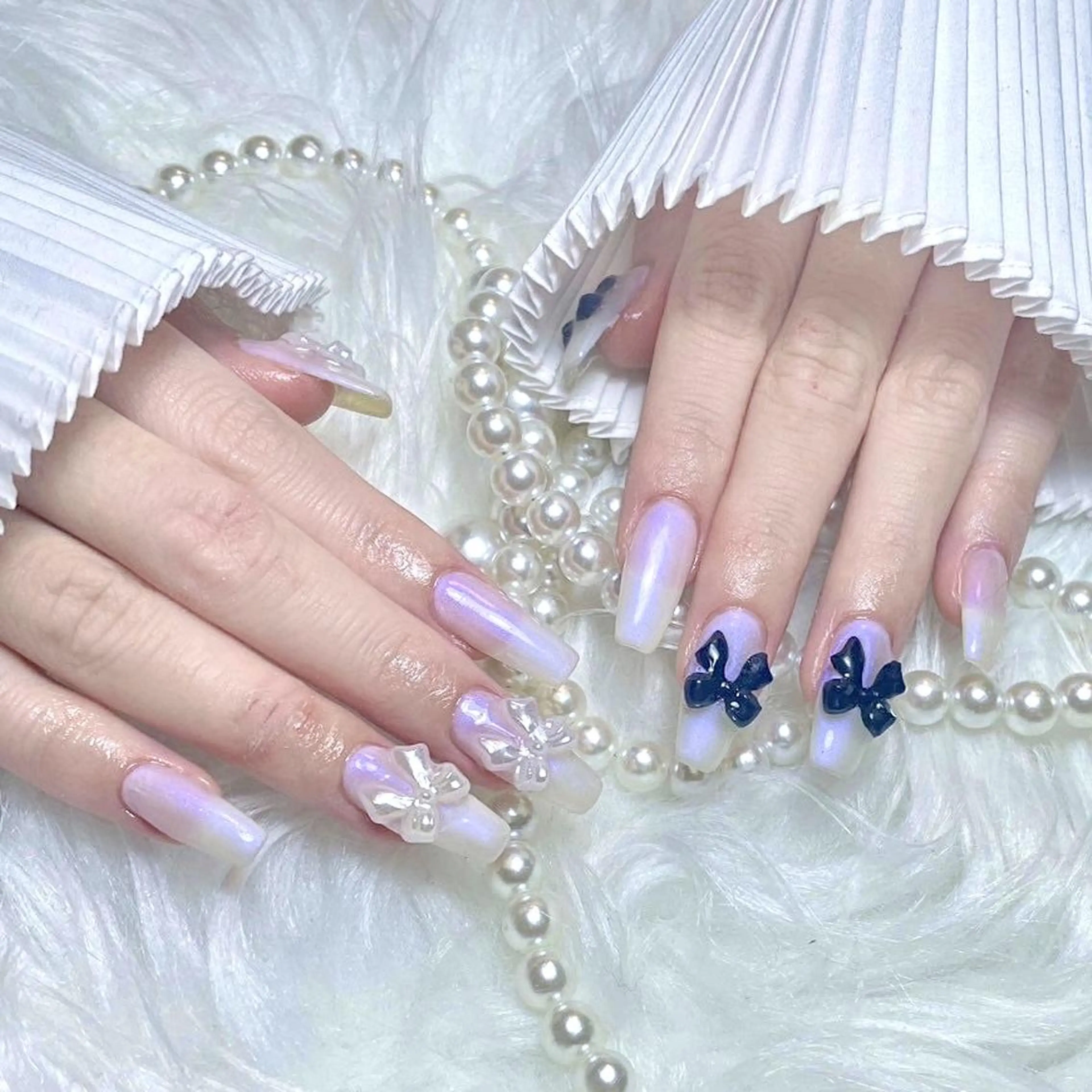 ネイル RAFFINE 月🦋🩵のネイルデザイン