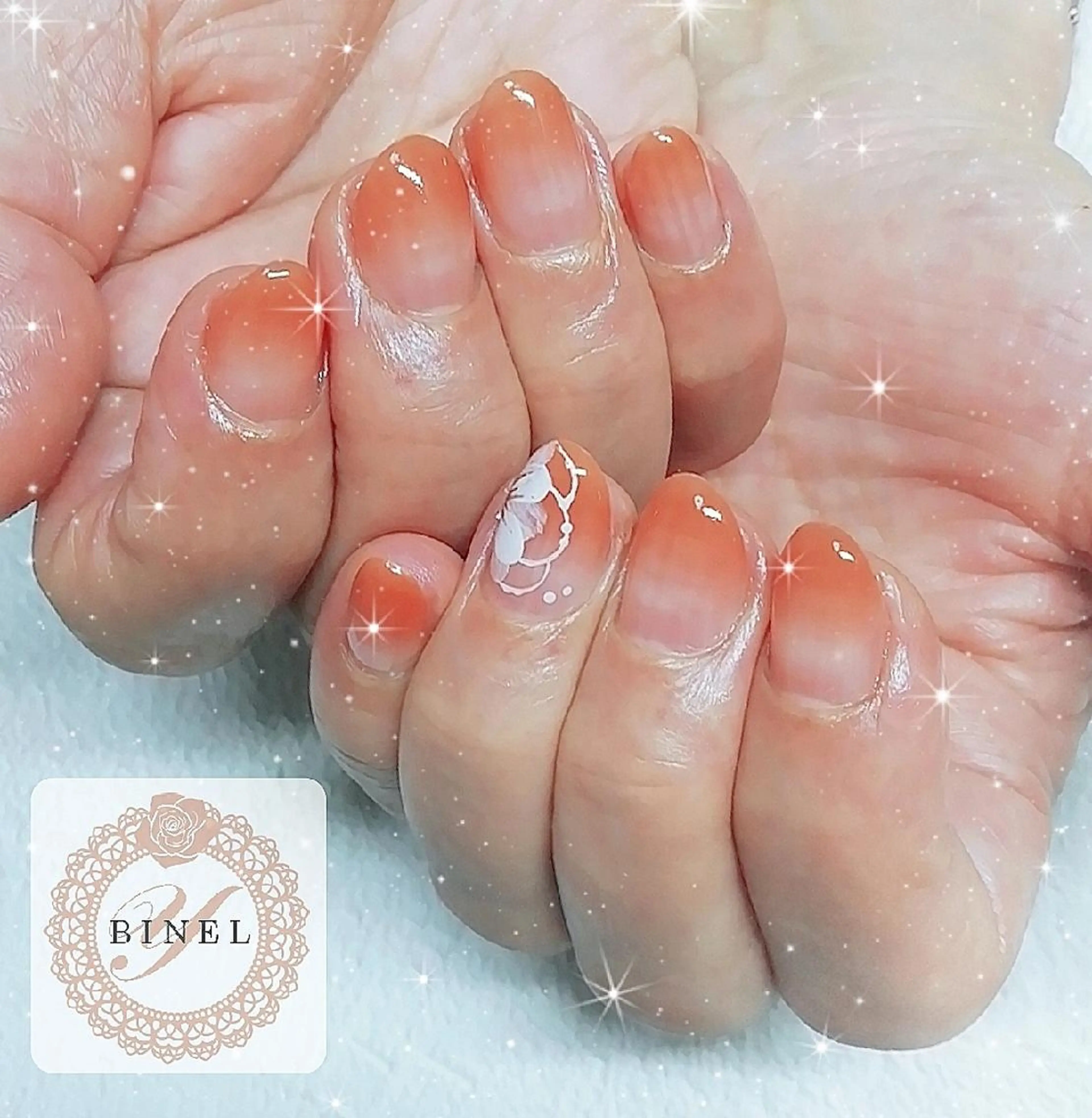 ネイル フラワーネイル グラデーション オレンジ ハンドネイル Nail Salon Y.BINELのネイルデザイン