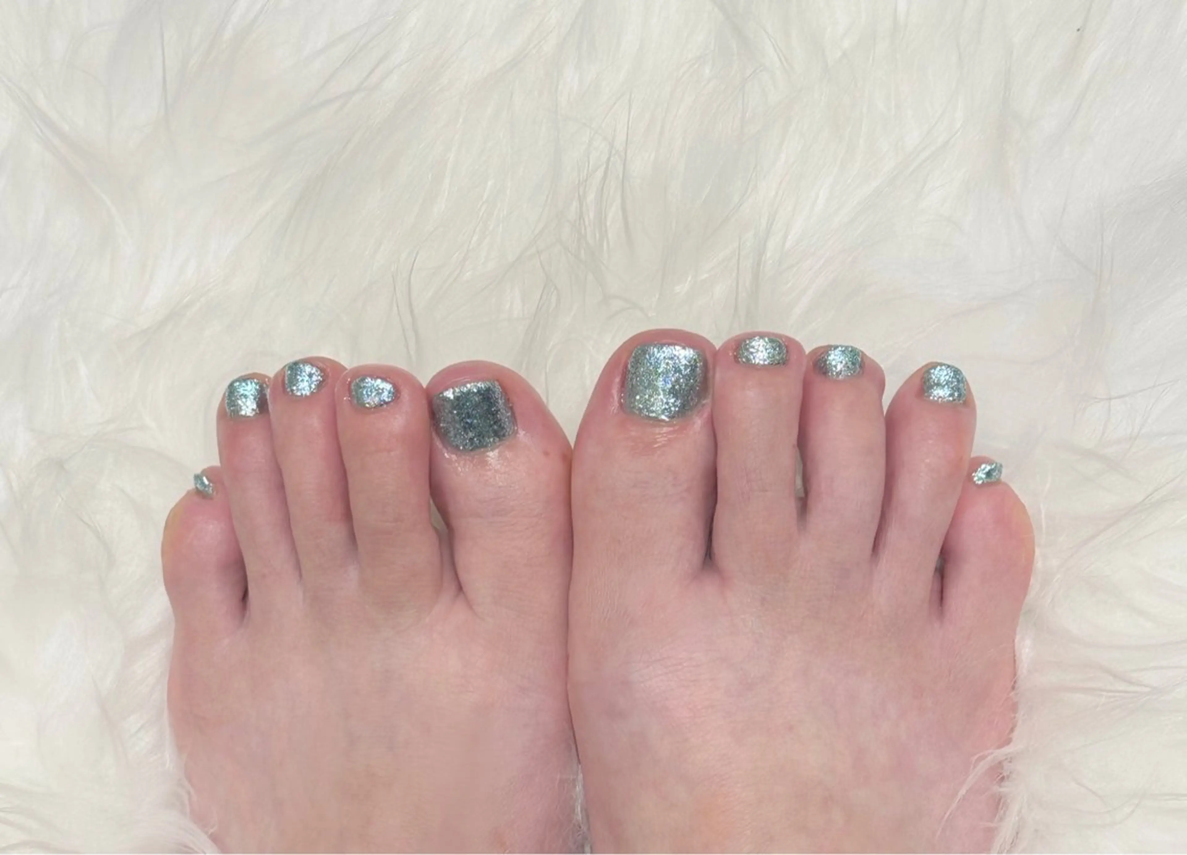 ネイル ブルー キラキラネイル ラメ(グリッター) フットネイル Nail Salon Miranda所属・Miranda Beautyのエステ・リラクイメージ