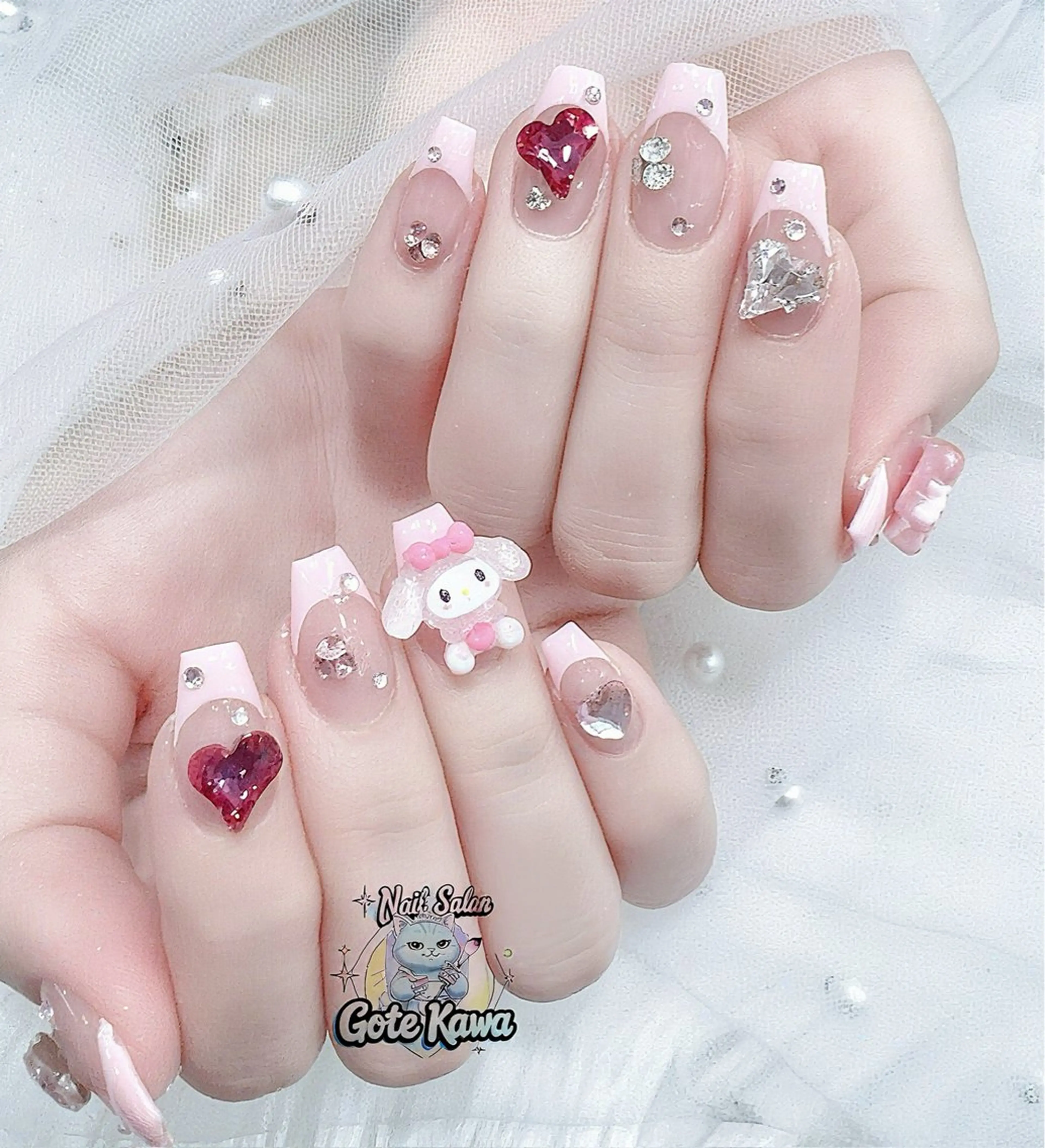 ネイル アートネイル 長さ出し キラキラネイル ピンク リボン ハンドネイル ハンドケア GOTE KAWA Nail Salon(ゴテかわ)所属・Gote Kawa nail salonのネイルデザイン