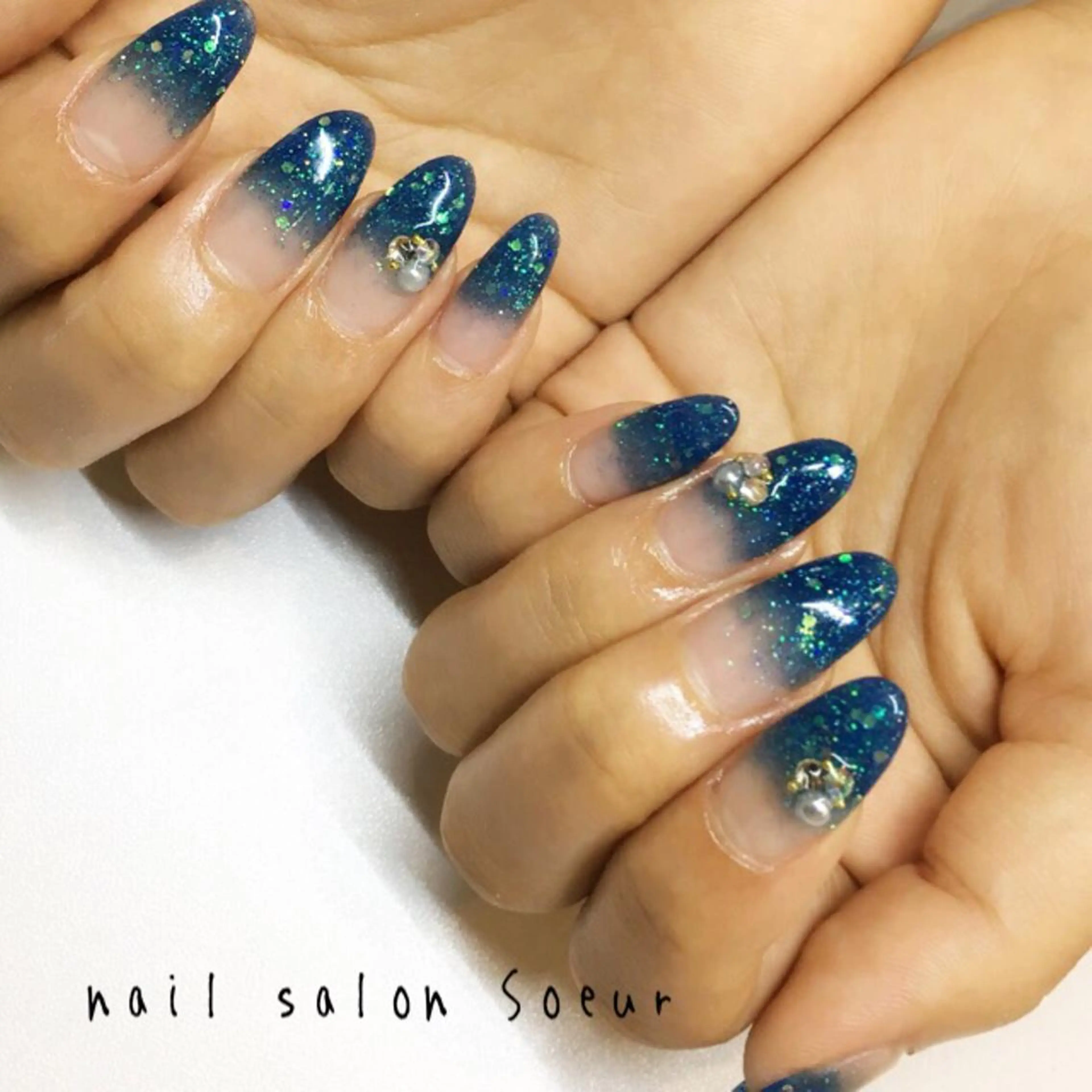 ネイル ブルー 長さ出し グラデーション ラメ(グリッター) ラメグラデーション ハンドネイル nail salon Soeurのネイルデザイン