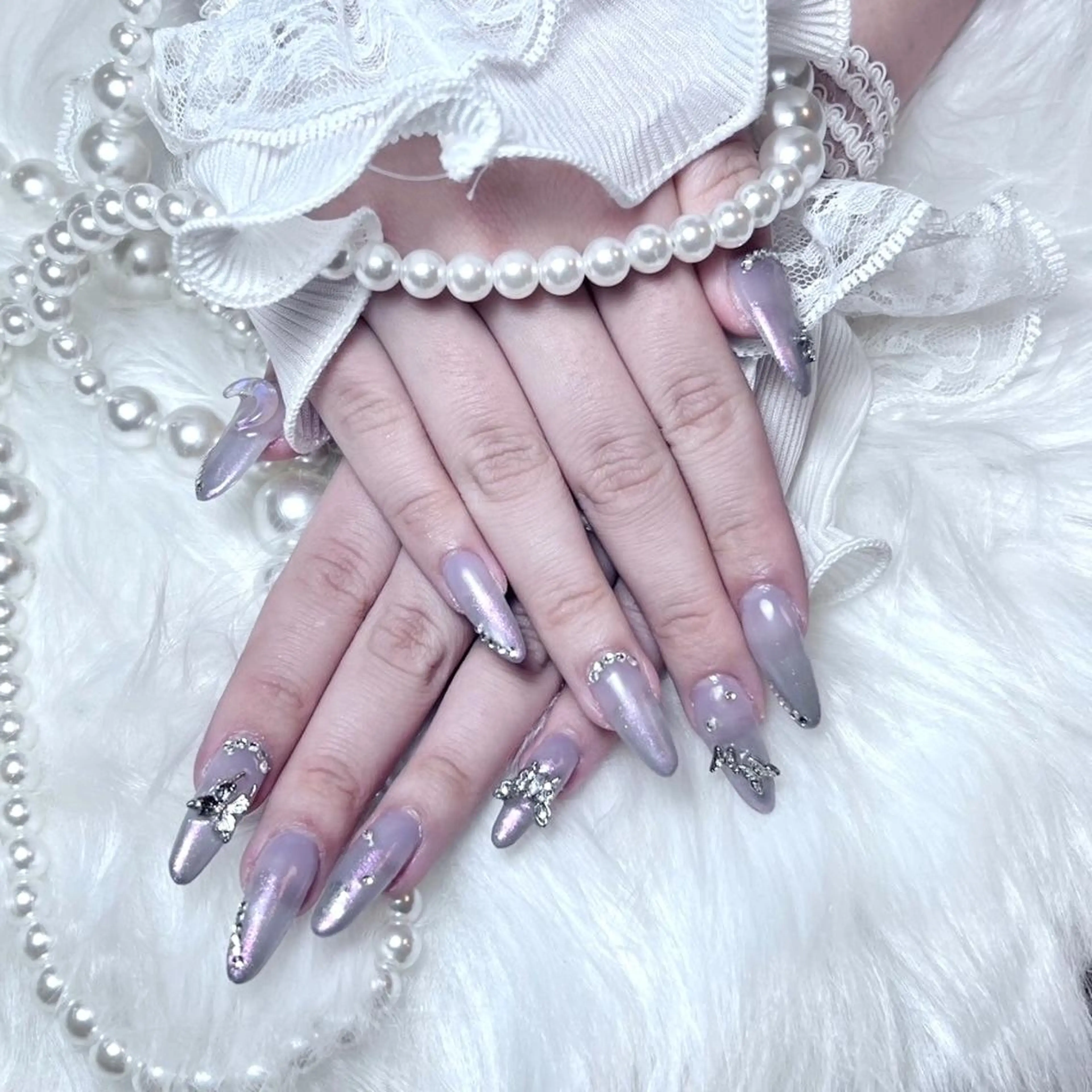 ネイル RAFFINE 月🦋🩵のネイルデザイン