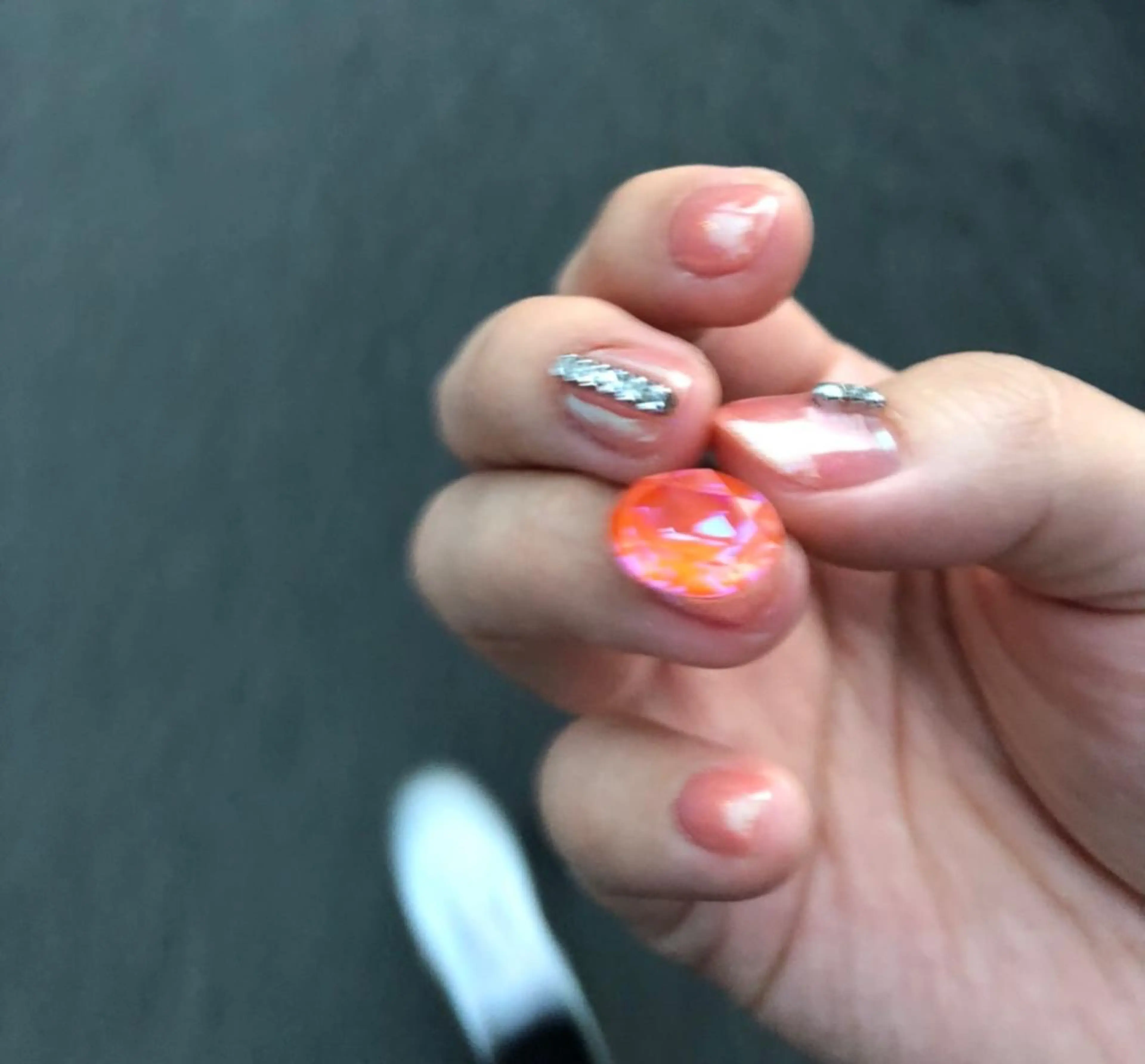 ネイル オーロラネイル キラキラネイル オレンジ ストーンネイル ☽ ☾のネイルデザイン
