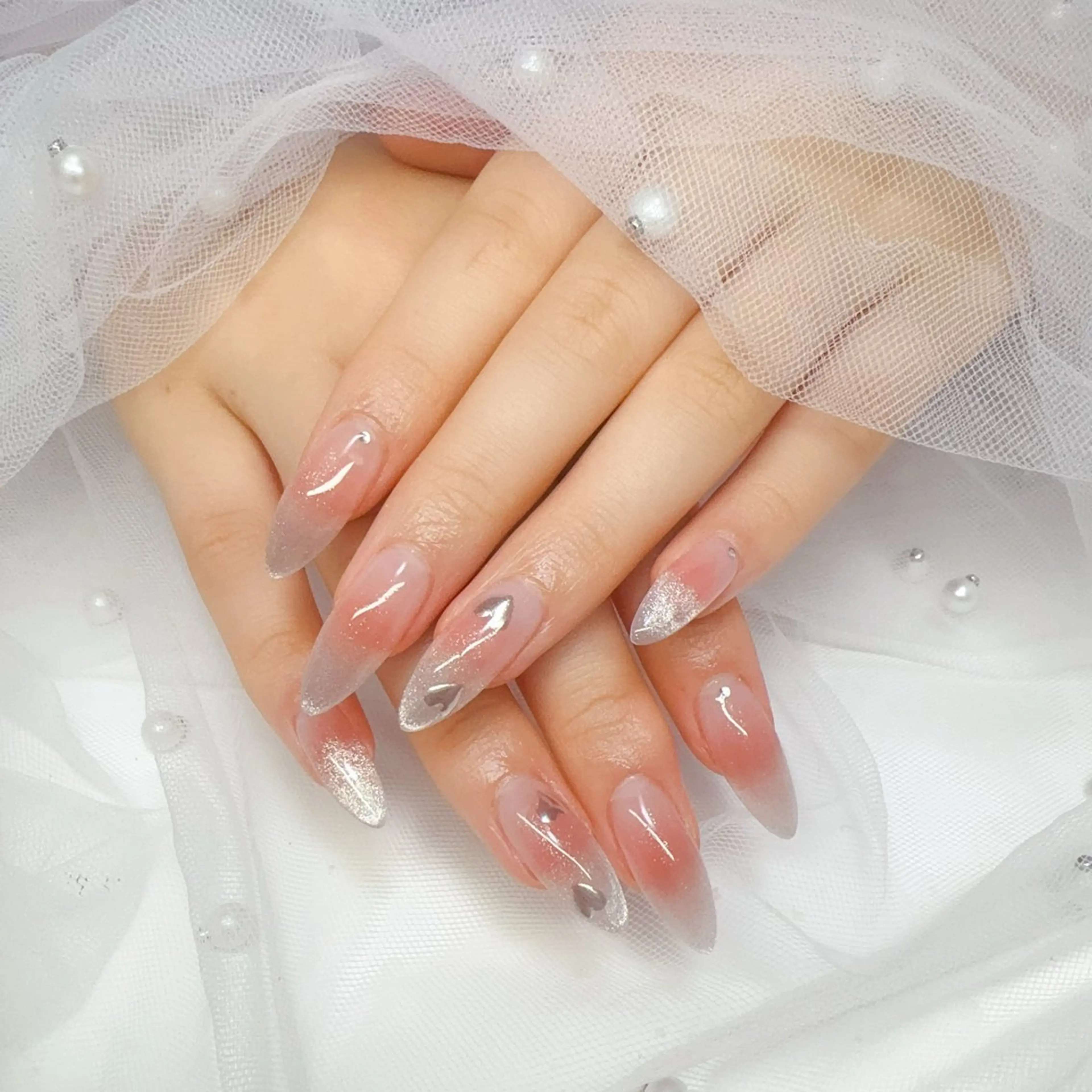 ネイル オーロラネイル チークネイル 桜ネイル 長さ出し ジェルネイル ハンドネイル YUYI.nail salonのネイルデザイン