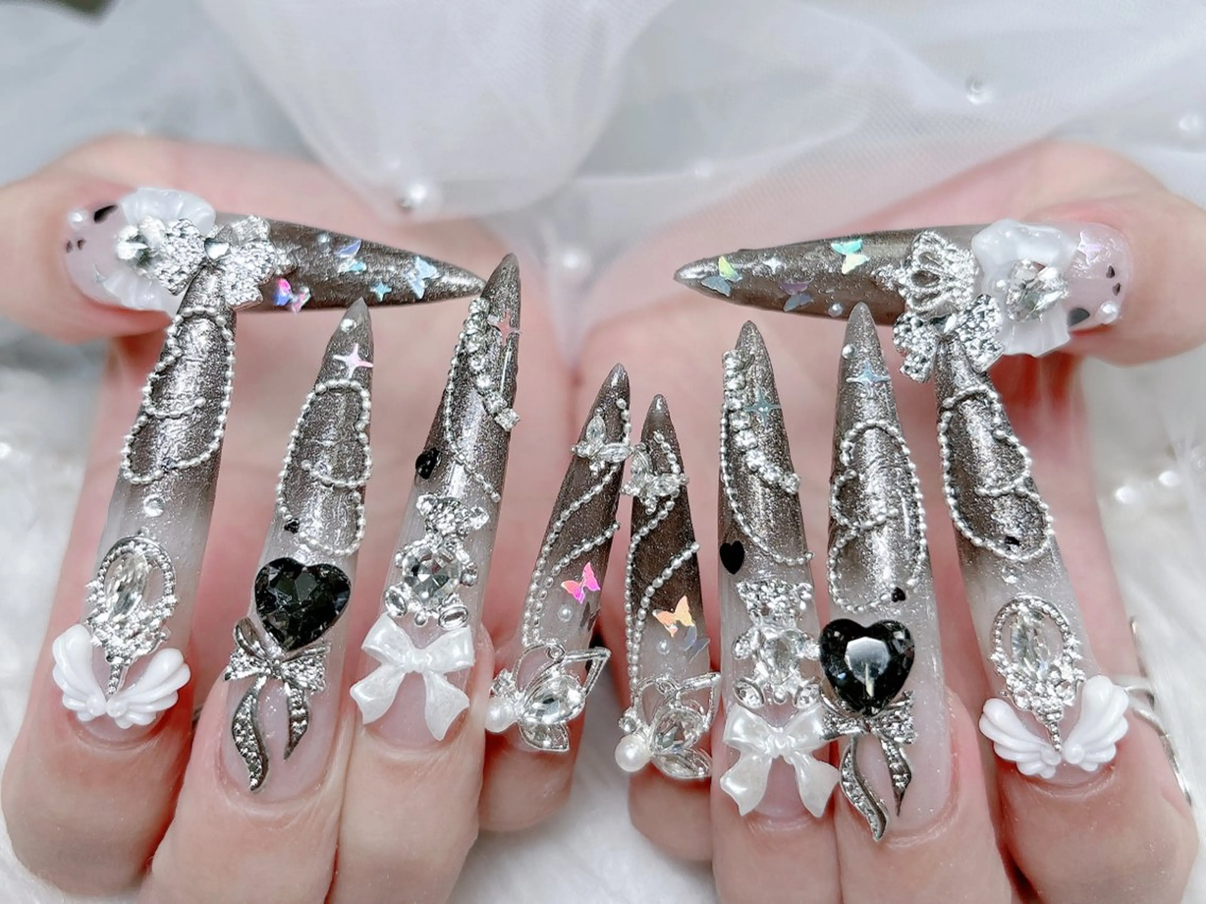 ネイル 成人式 ロングネイル マグネットネイル 大理石ネイル(マーブル) リボン ハンドネイル MoMoA Nail ネイル長さ出し専門店のネイルデザイン