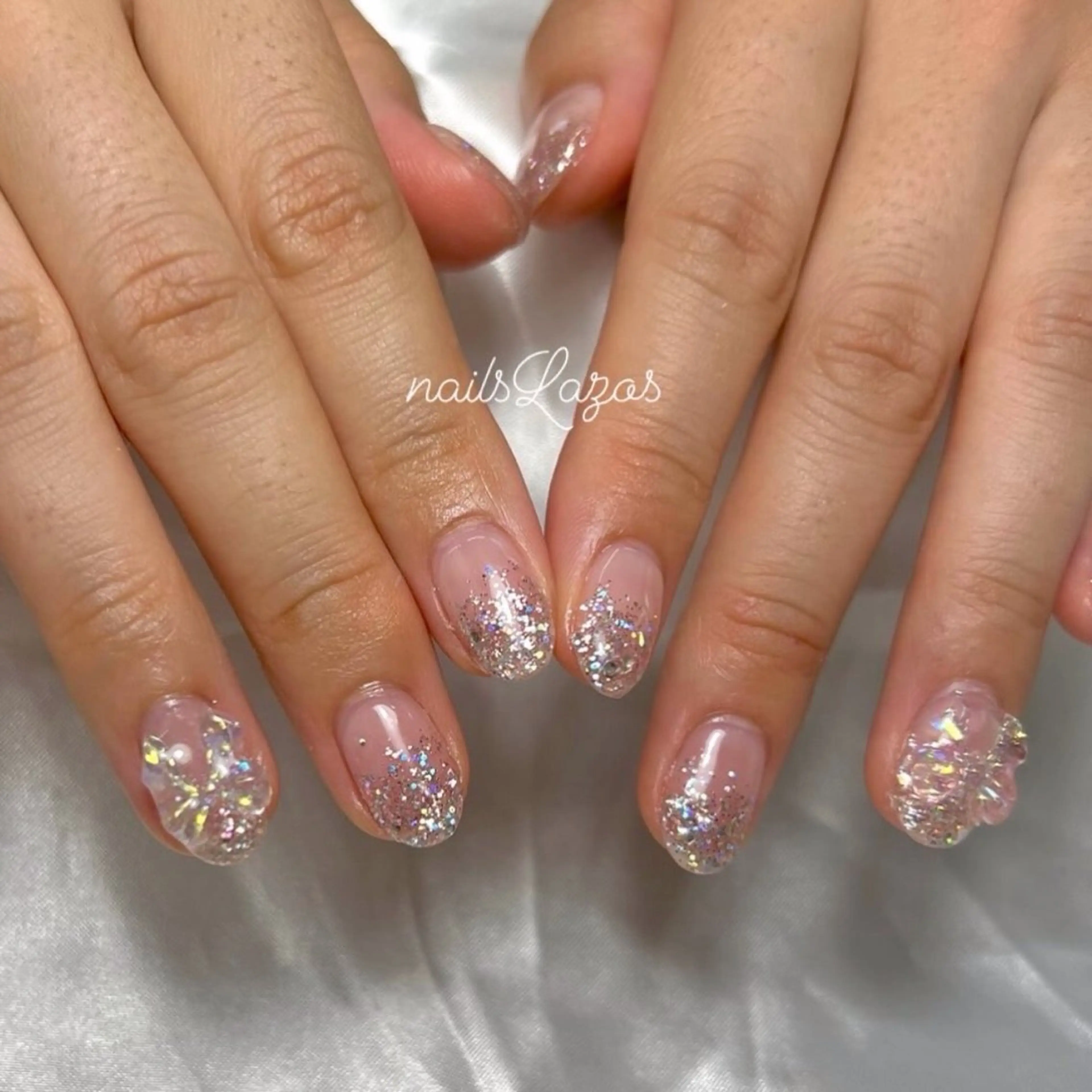ネイル グラデーション ラメ(グリッター) ラメグラデーション リボン nails Lazosのネイルデザイン