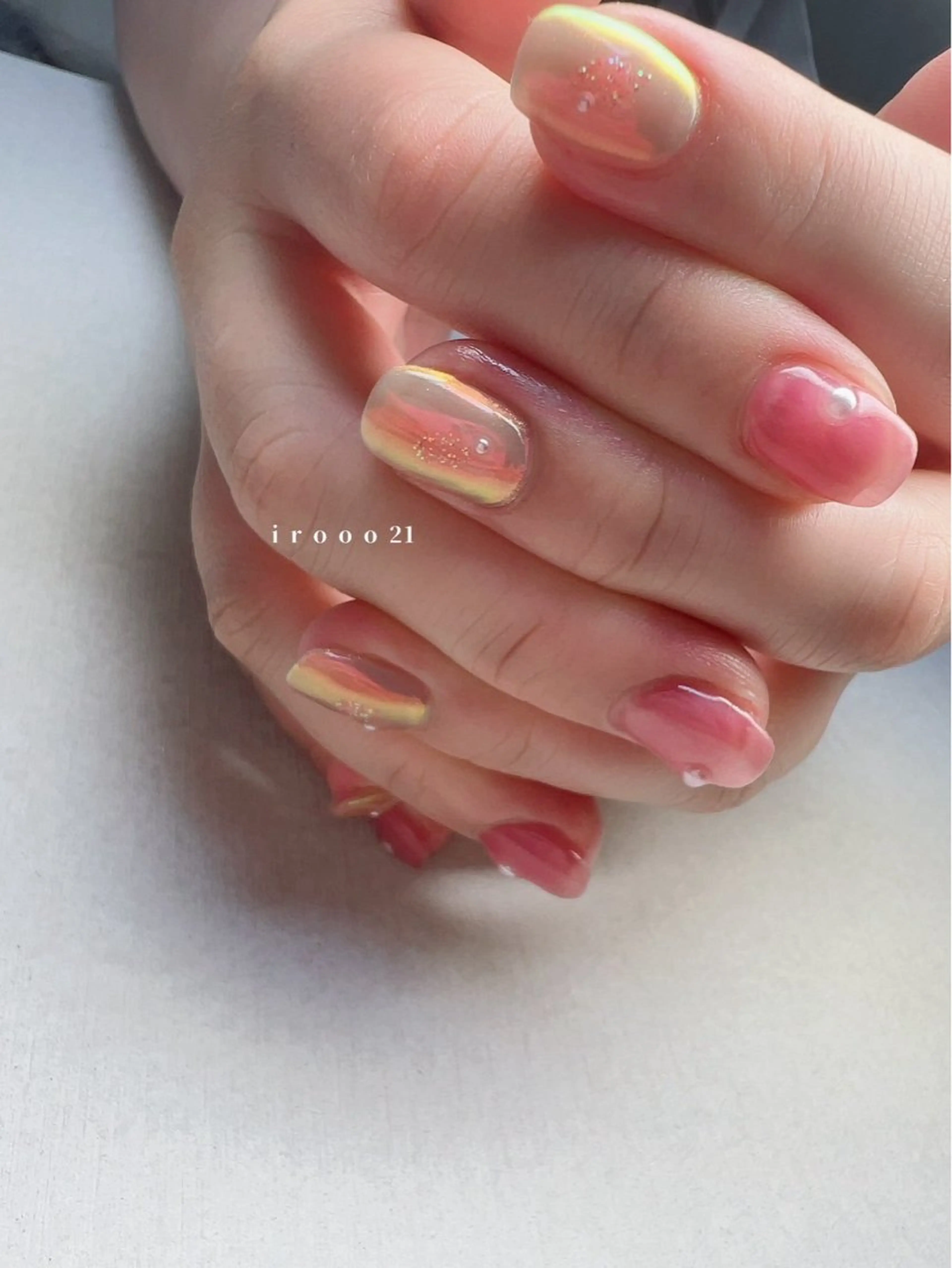 ネイル オーロラネイル 氷ネイル・うるうるネイル キラキラネイル マグネットネイル オレンジ irooo 21のネイルデザイン