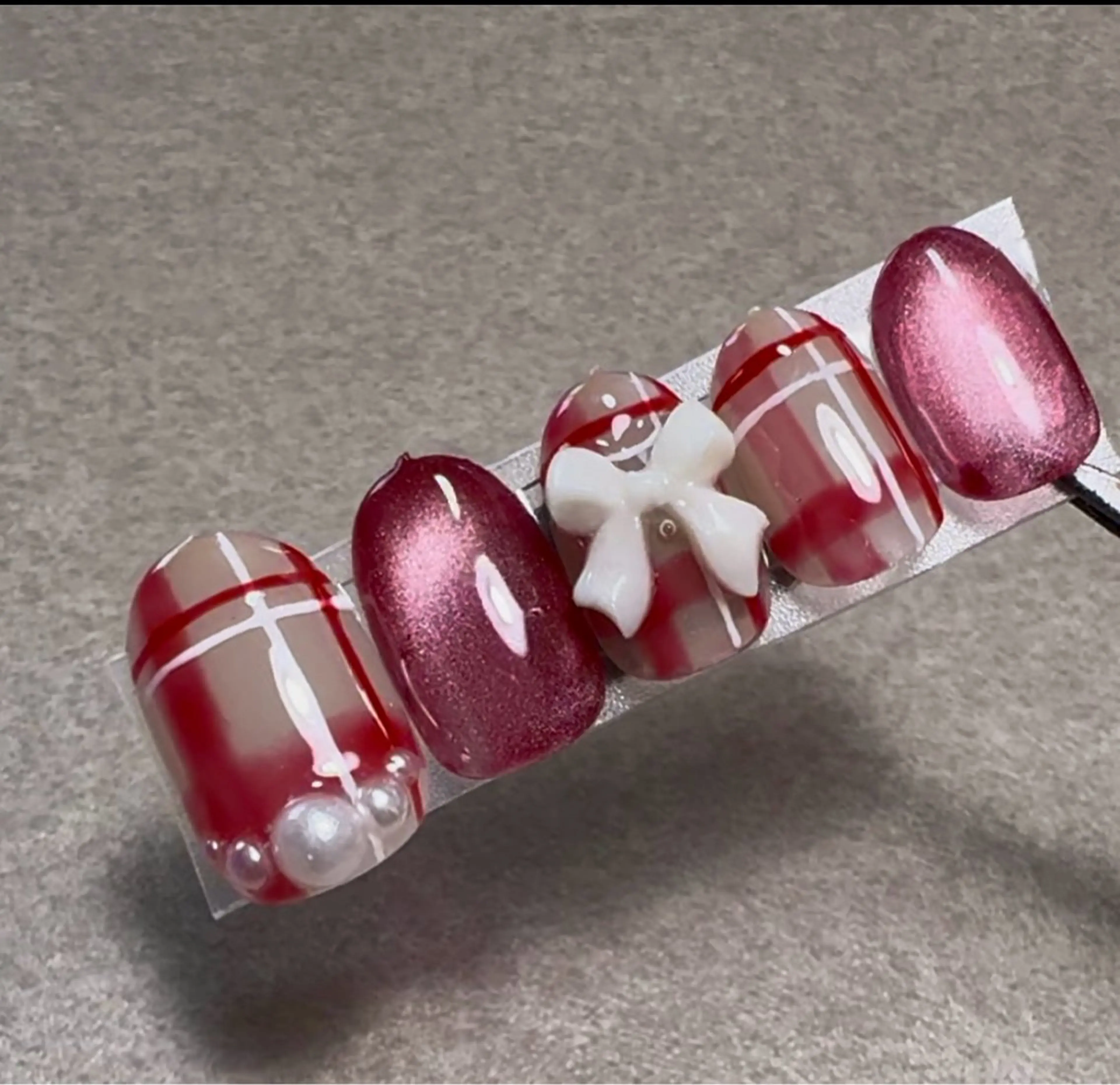 ネイル リボン ハンドネイル una salon / ネイル&顔脱毛のエステ・リラクイメージ