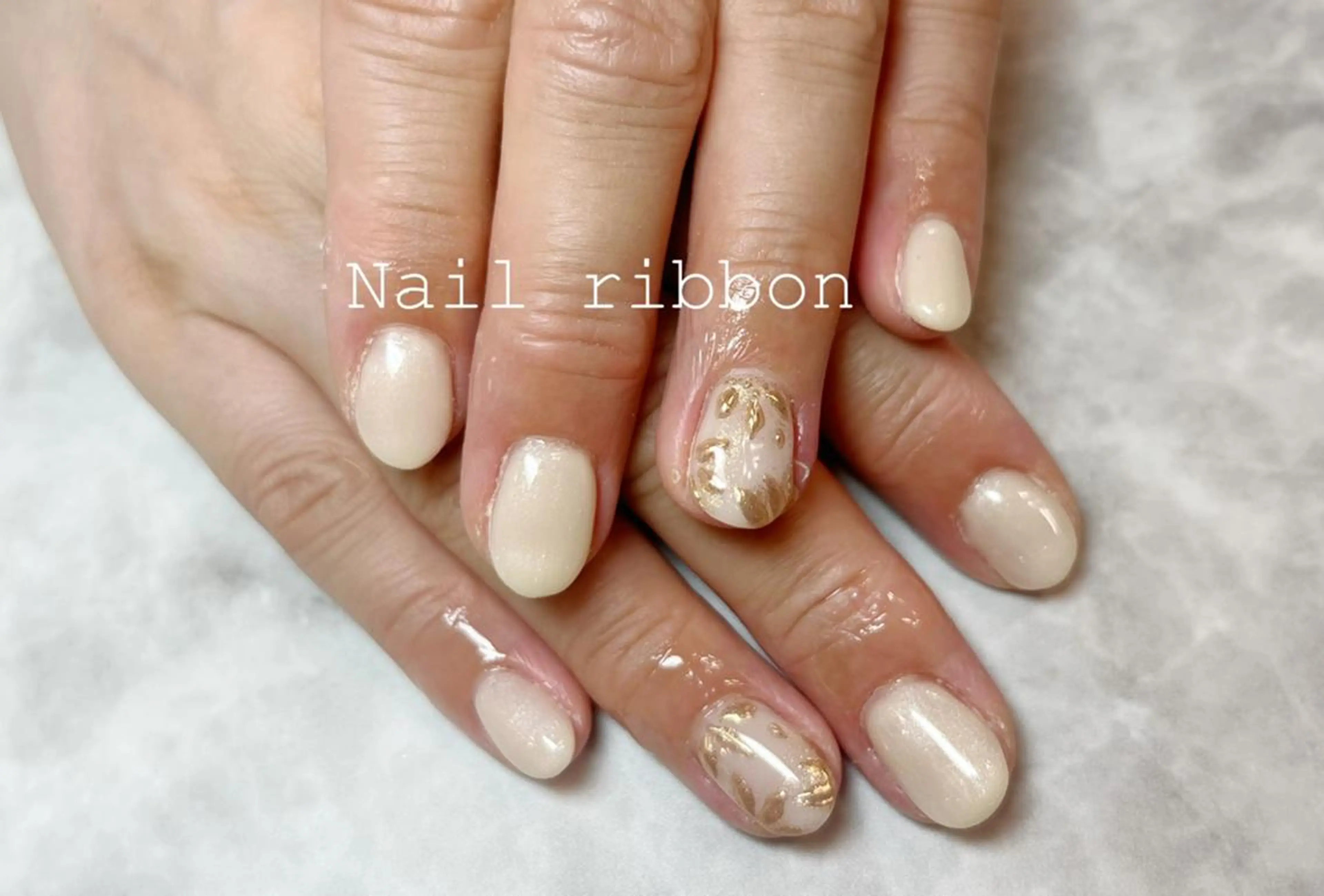 ネイル ネイルリボン 受付スタッフのネイルデザイン