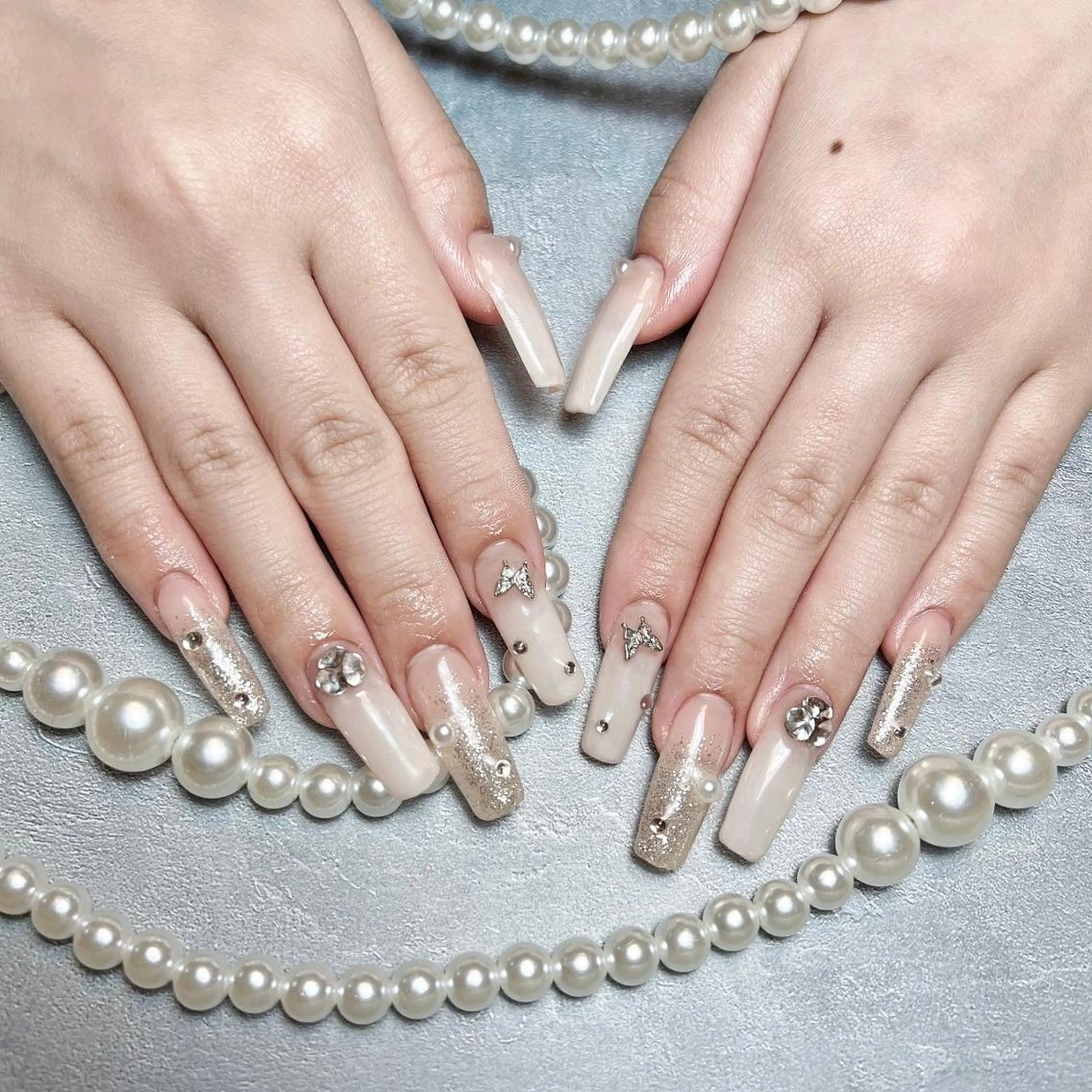 ネイル RAFFINE 月🦋🩵のネイルデザイン