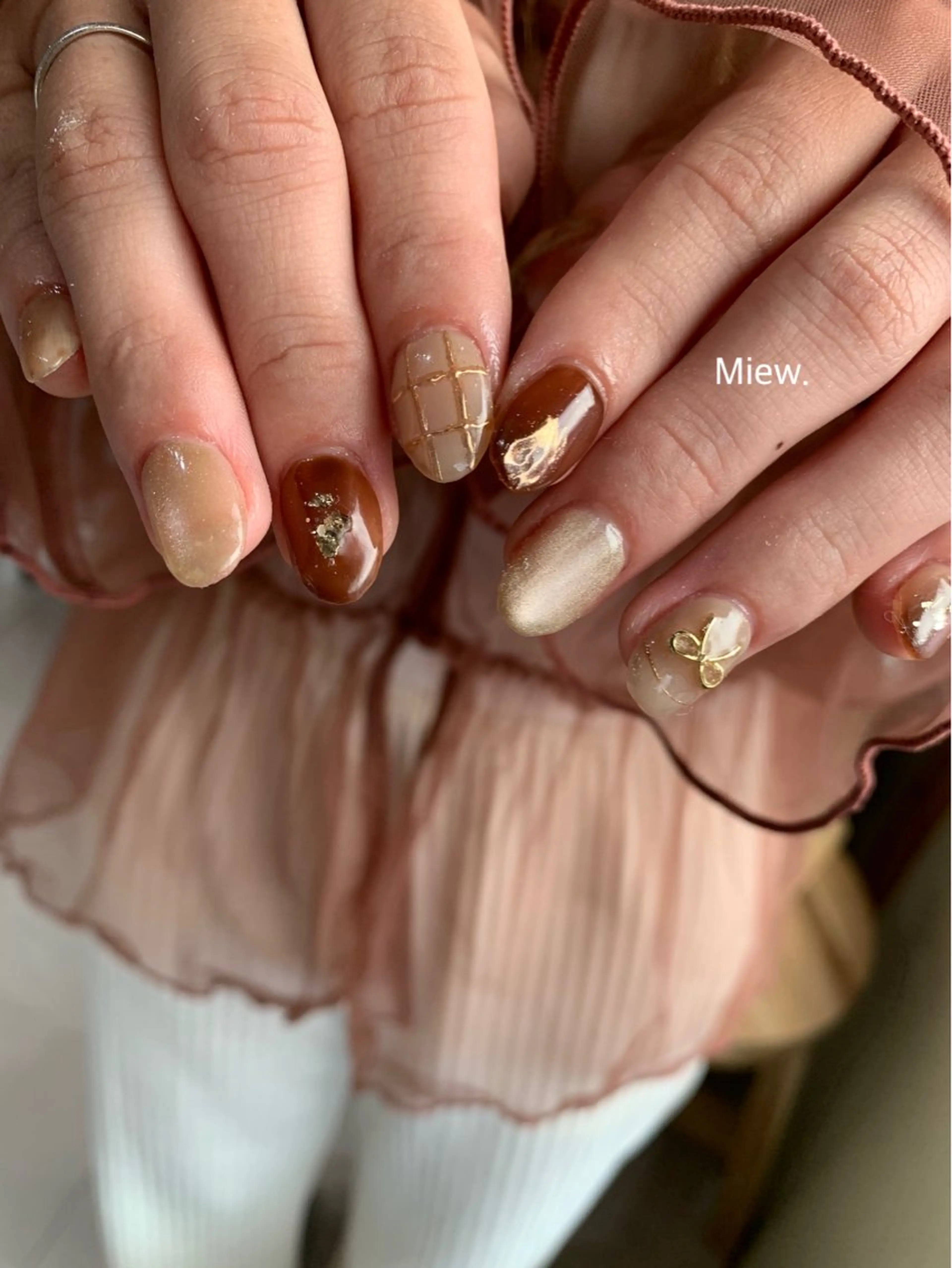 ネイル Mina🫧 【Miew.】のネイルデザイン