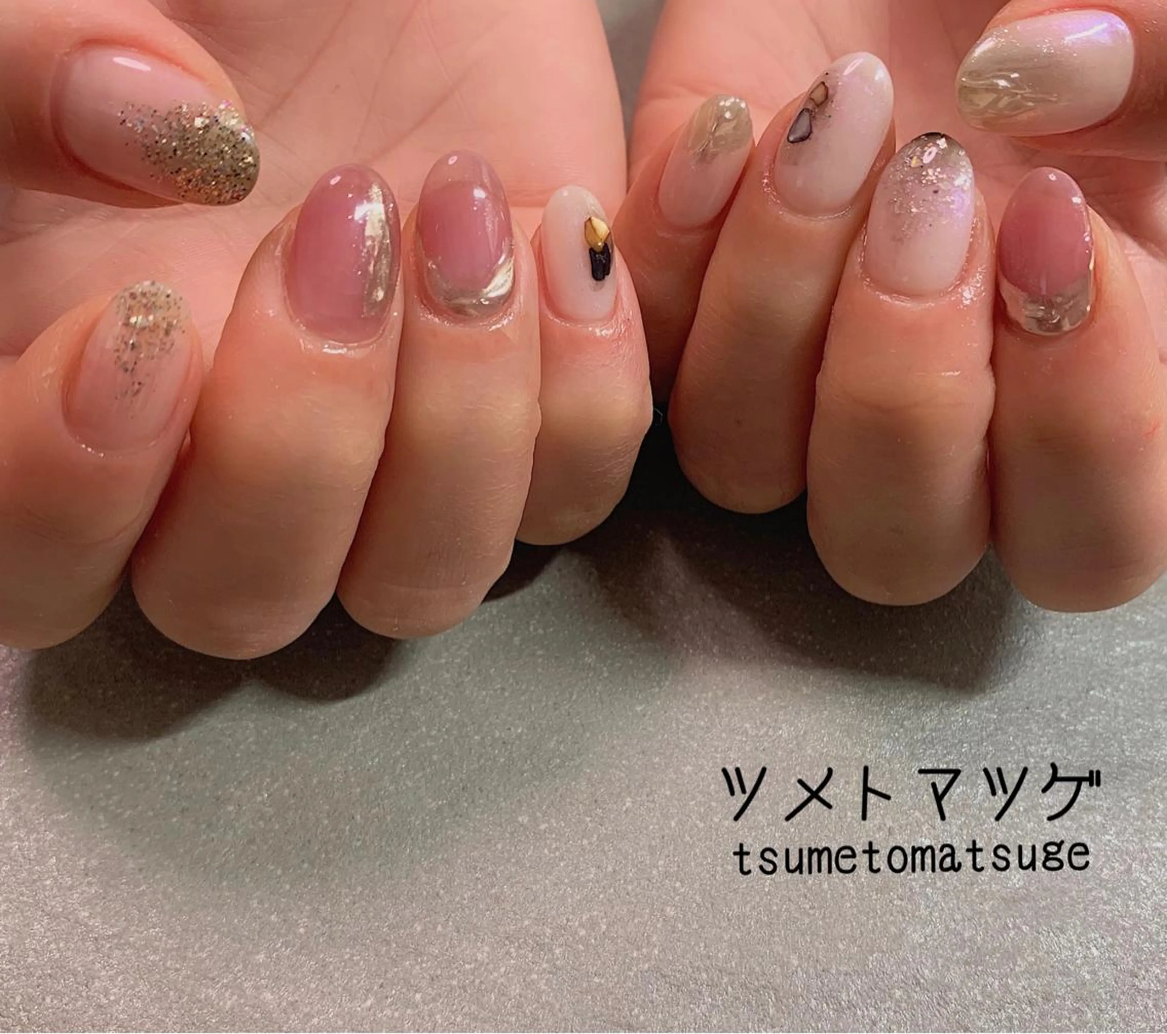 ショート ハンドネイル ツメトマツゲ .のネイルデザイン