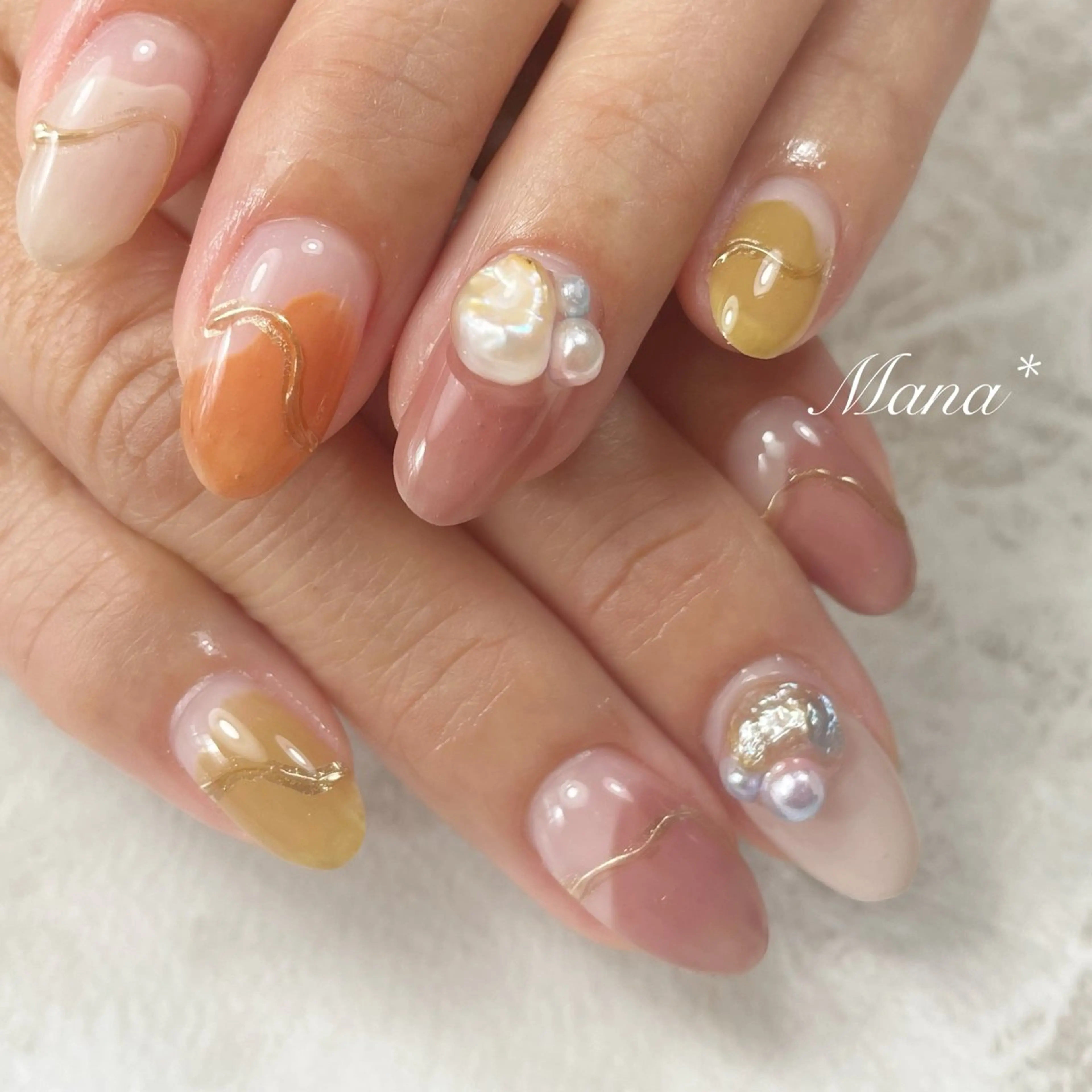 ミディアム 塚田 由香里のネイルデザイン