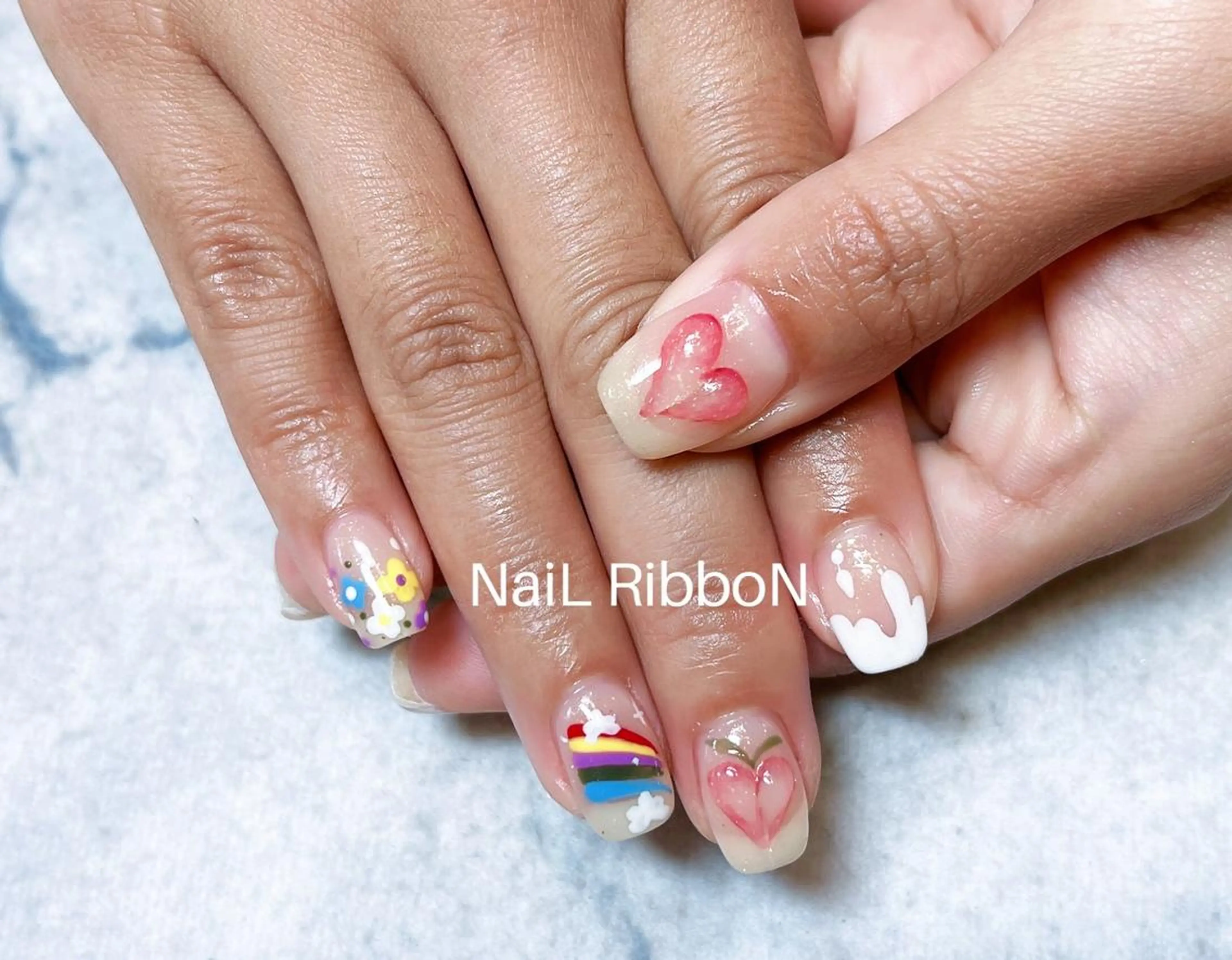 ネイル ネイルリボン 受付スタッフのネイルデザイン