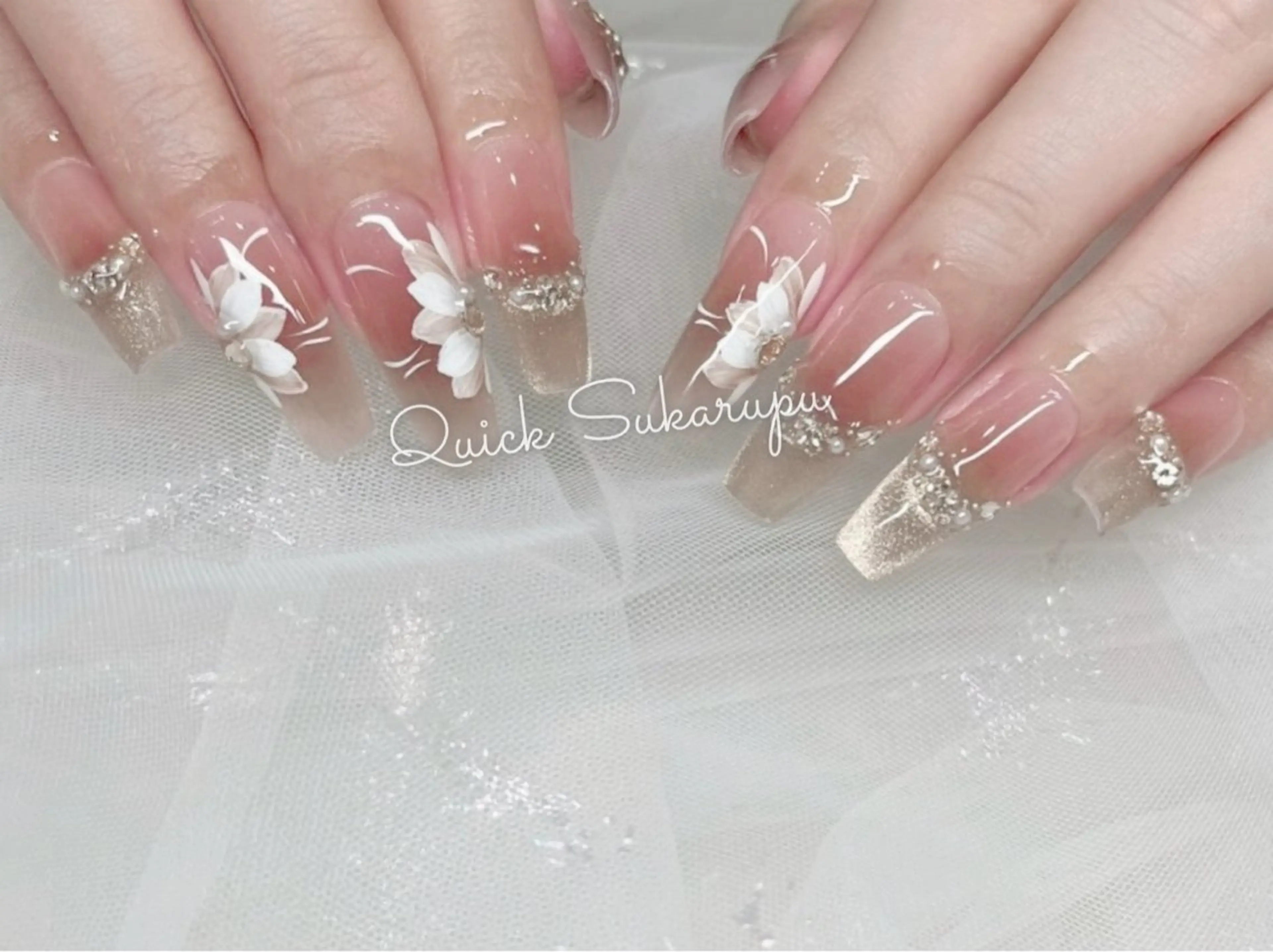 ロング ハンドネイル Quick Sukarupu 高田馬場店所属・Quick Sukarupuのネイルデザイン