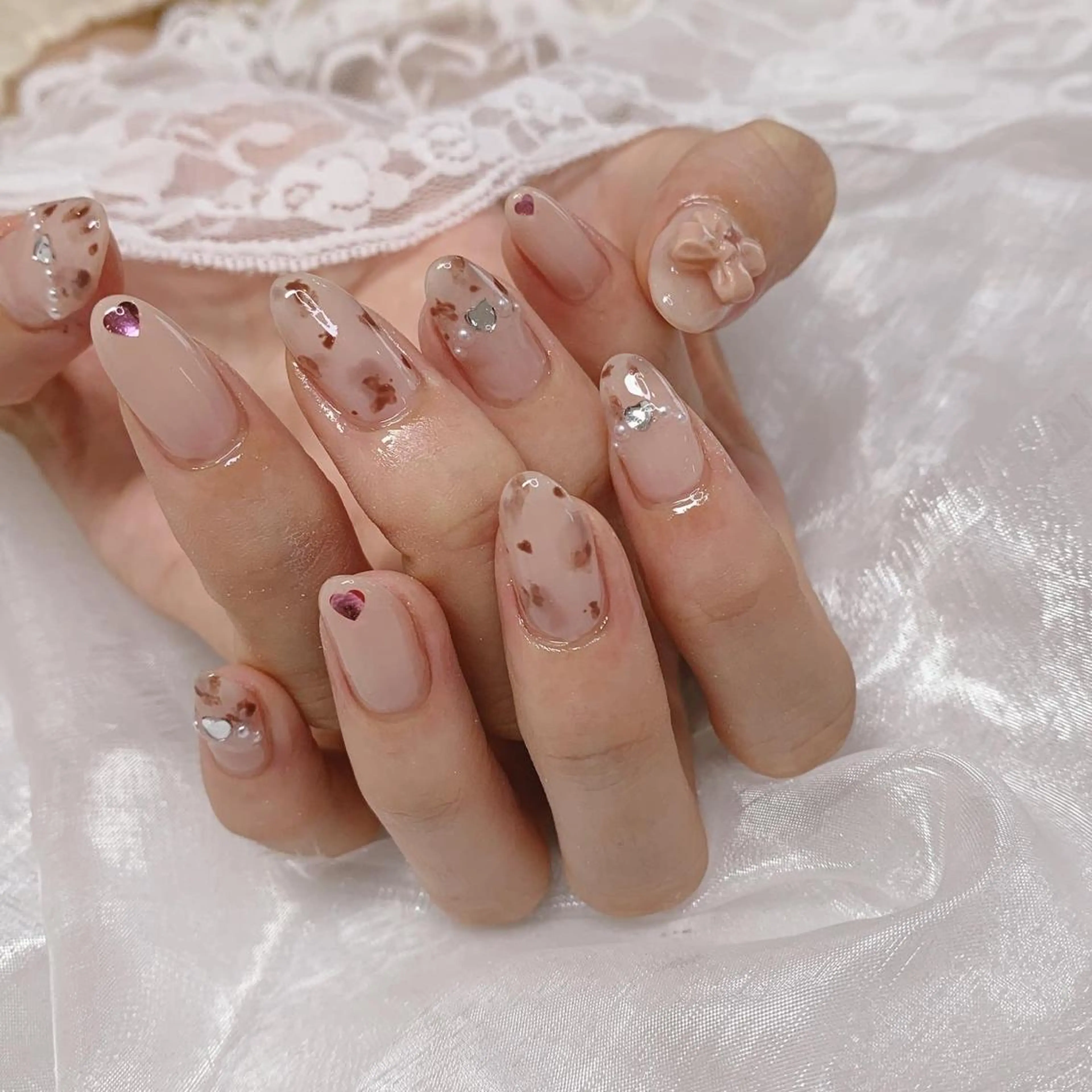 ネイル リボン ハンドネイル La neige* yuki 🥯🍑のネイルデザイン