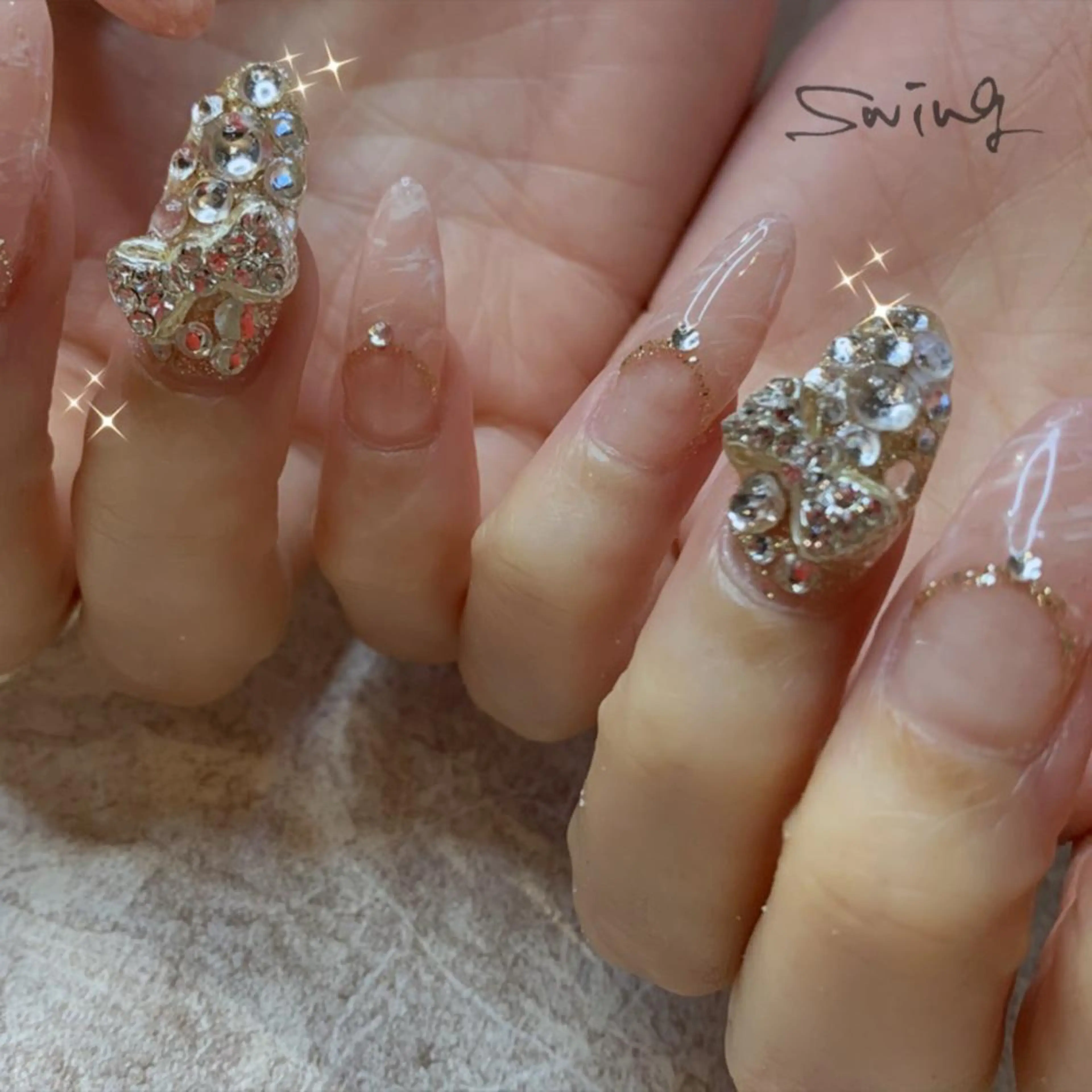 ネイル キラキラネイル リボン SWING Nail Salon所属・Yoshida Takakoのネイルデザイン