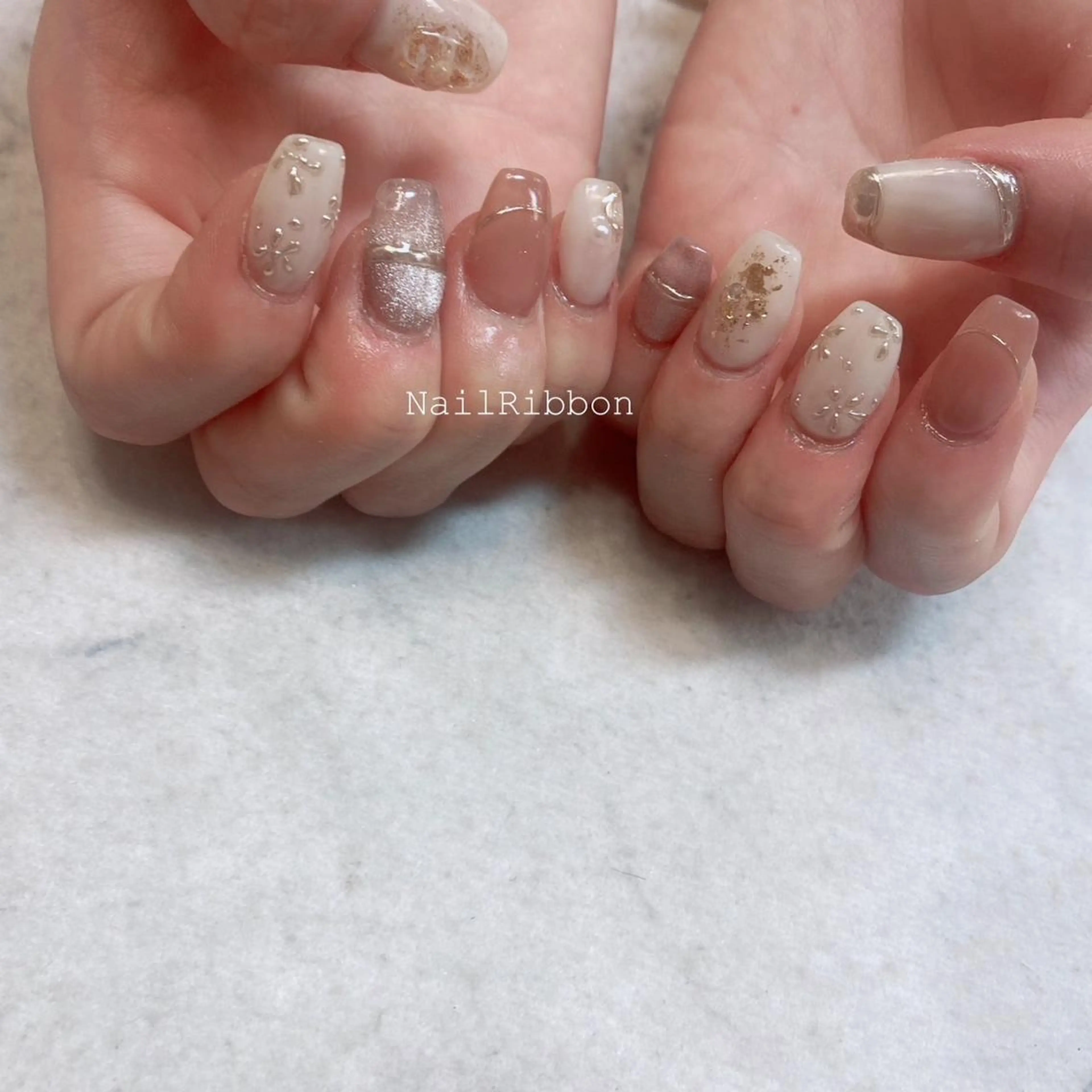 ネイル ネイルリボン 受付スタッフのネイルデザイン