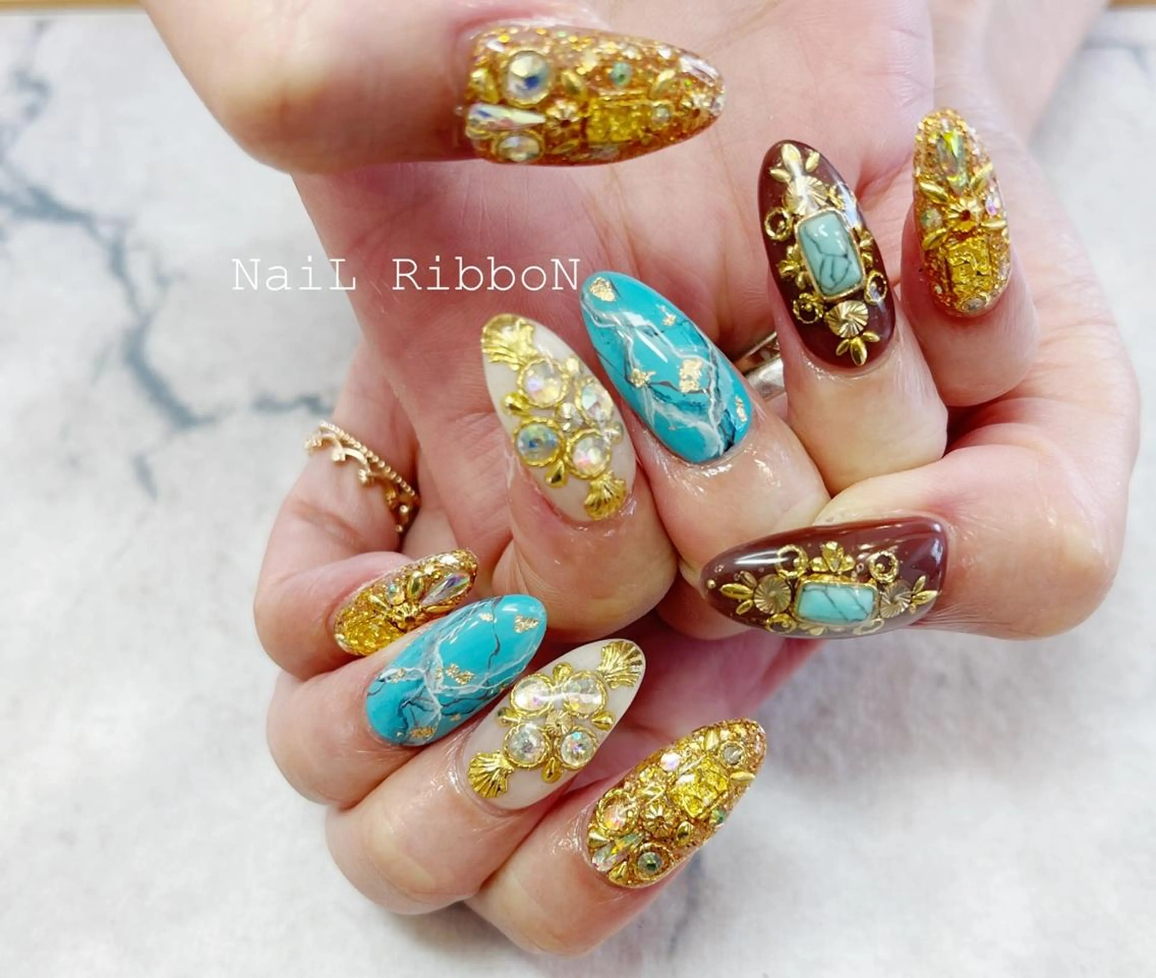 ネイル ネイルリボン 受付スタッフのネイルデザイン