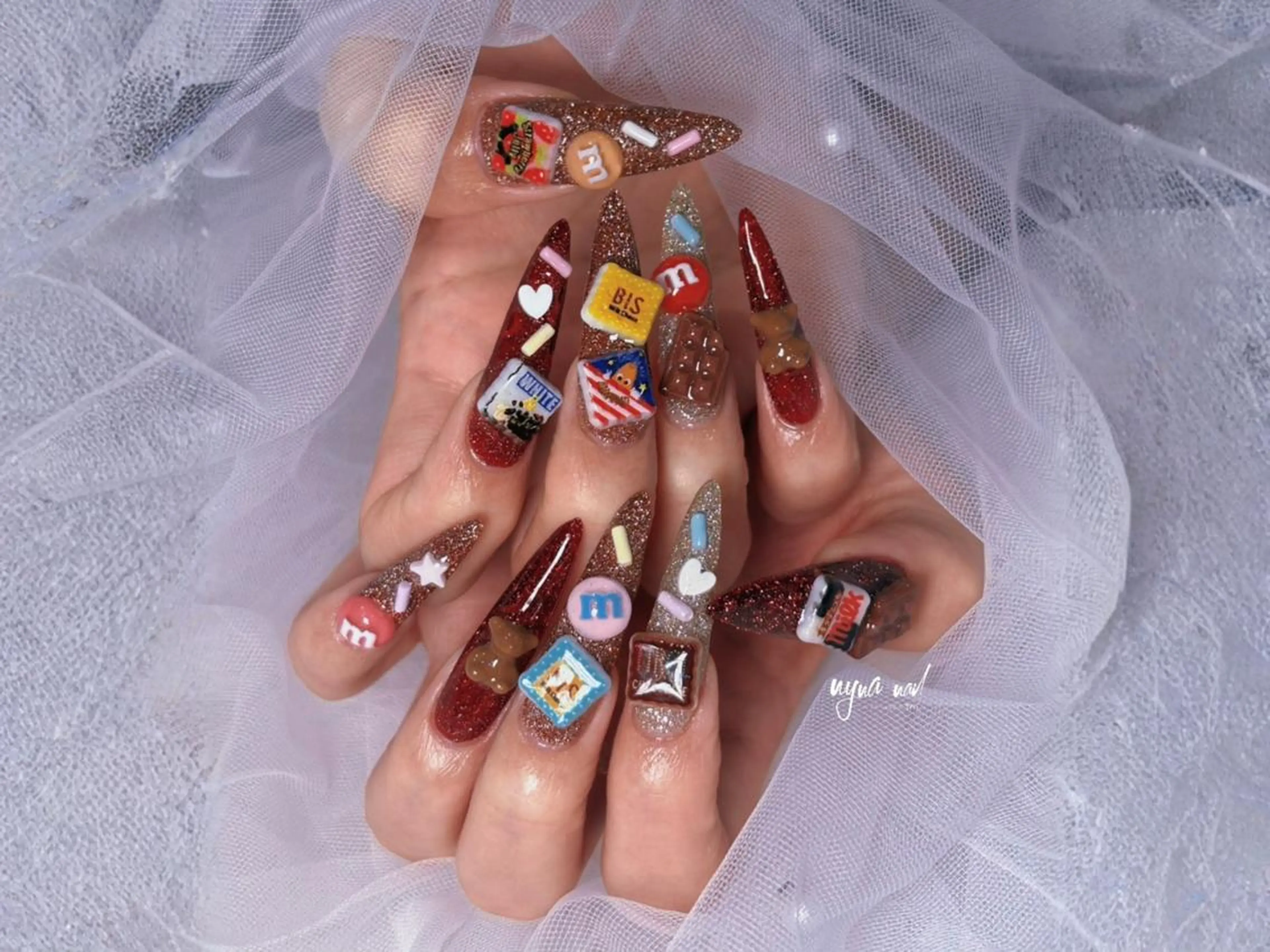 ロング ハンドネイル 長さ出し専門 nynaのネイルデザイン