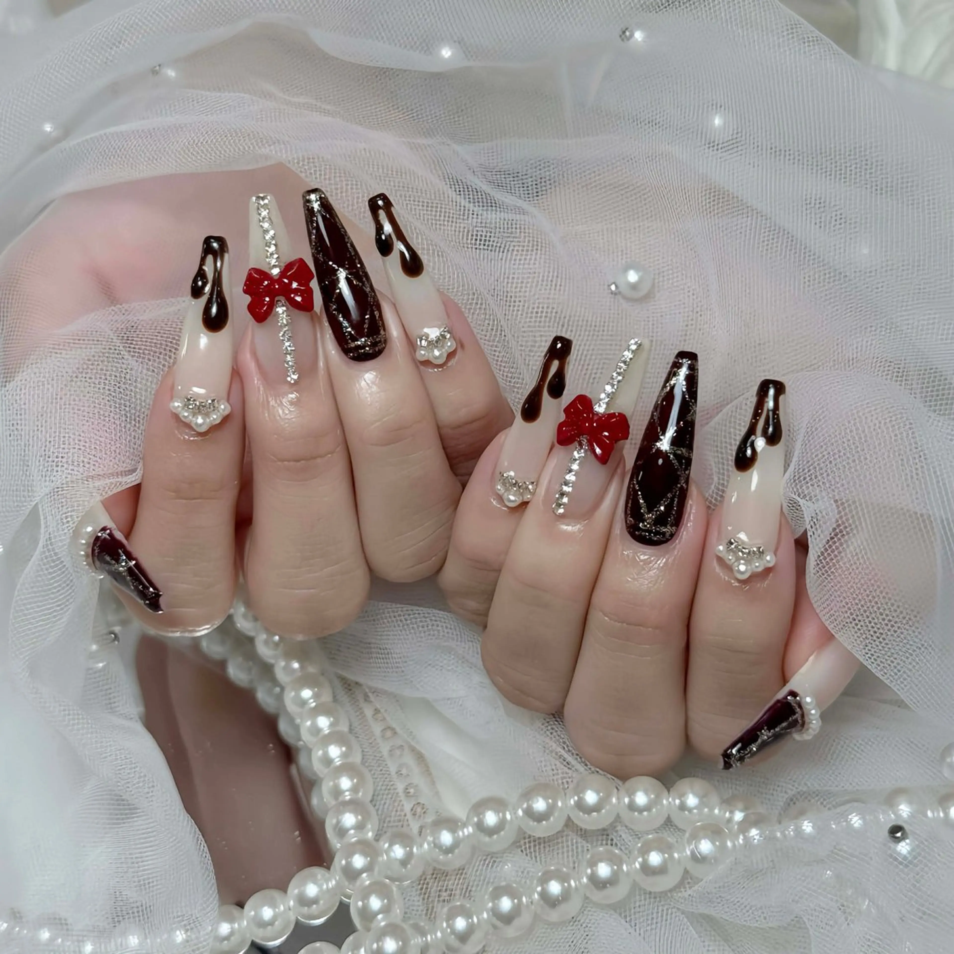 ネイル オーロラネイル ボルドー ブラウン 氷ネイル・うるうるネイル キラキラネイル ハンドネイル Julli NailStudioのネイルデザイン