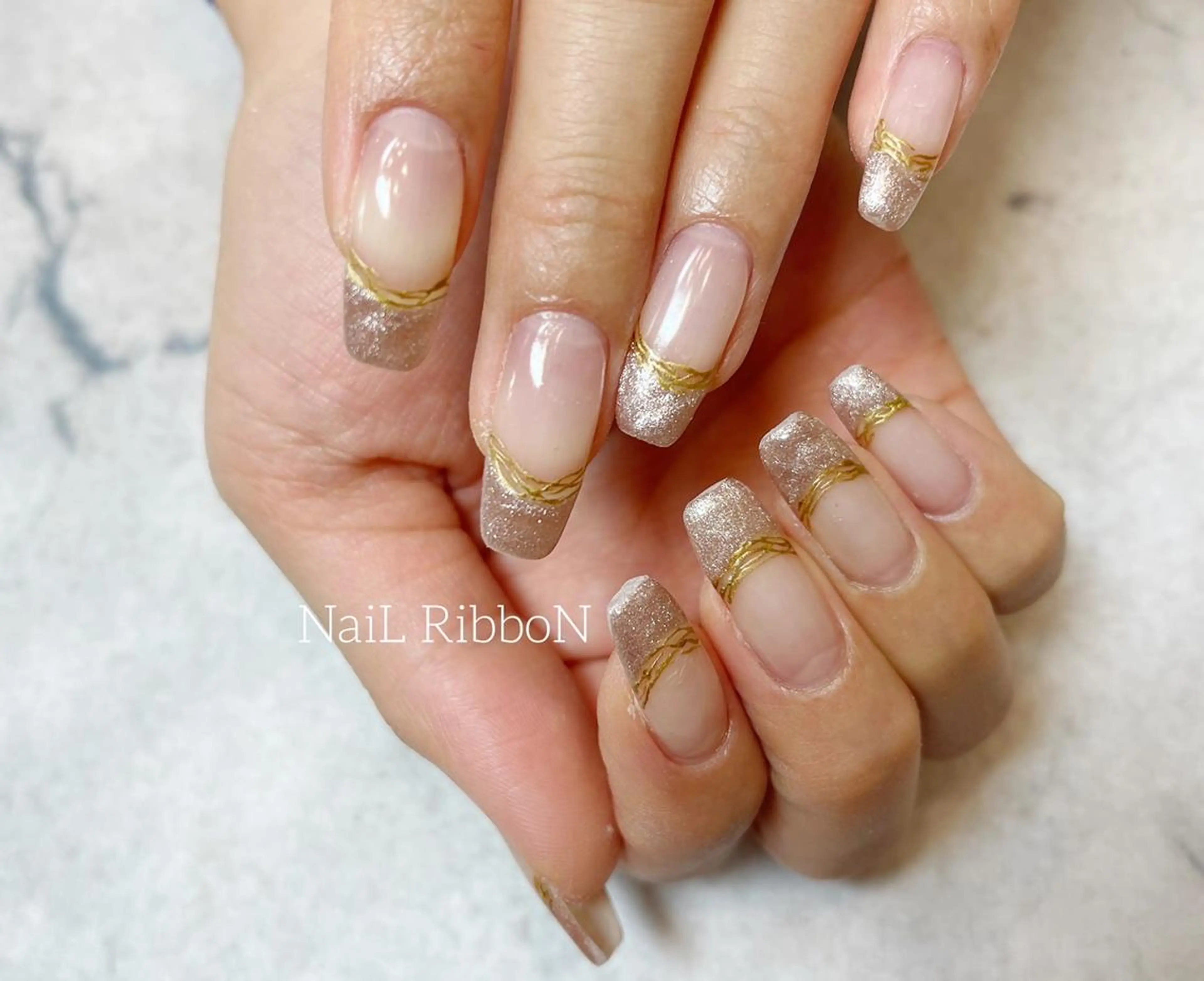 ネイル ネイルリボン 受付スタッフのネイルデザイン