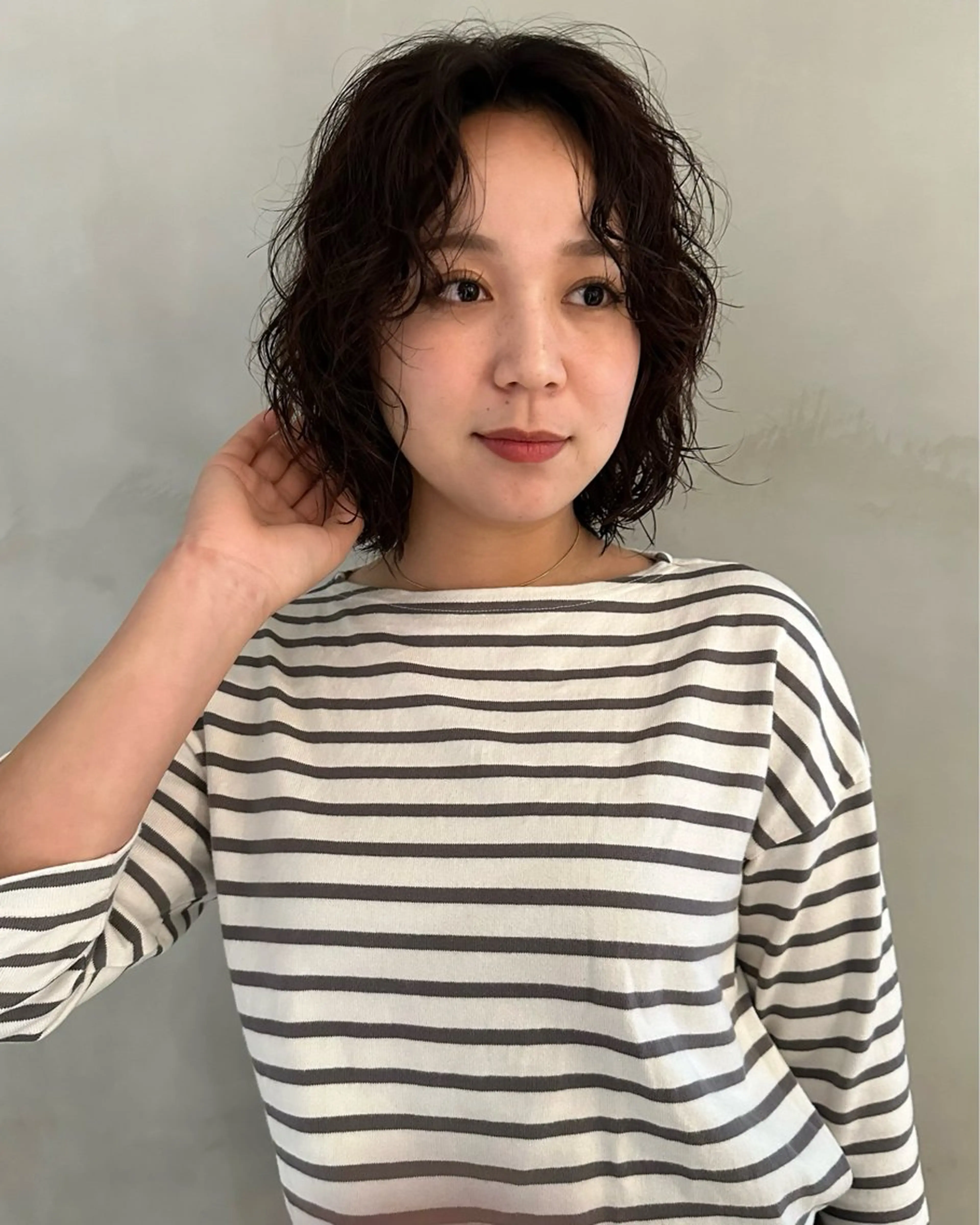 ミディアム パーマ 瓜谷 亮磨のヘアスタイル