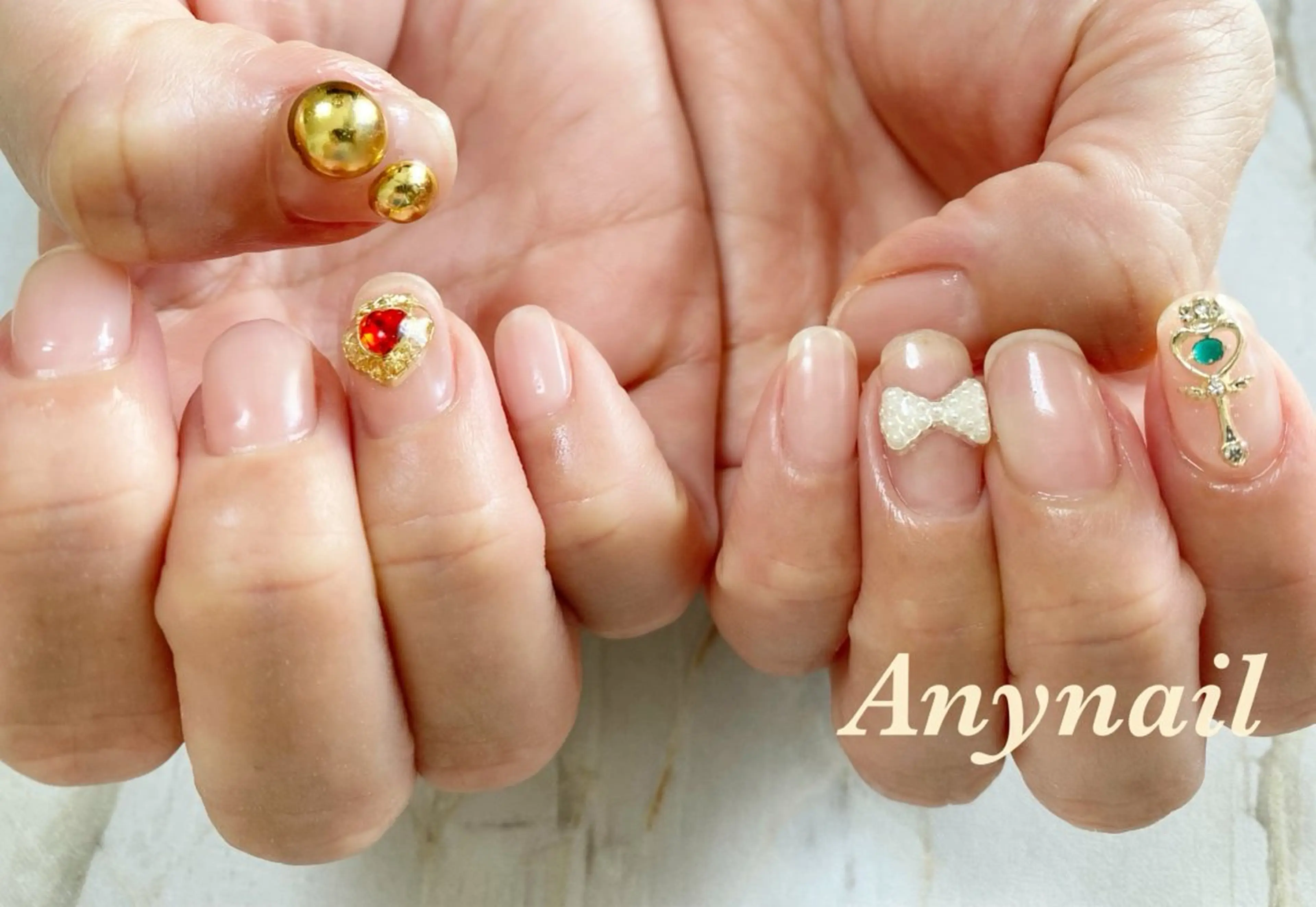 ネイル ブルー クリアネイル ハート リボン 岩澤 恵子のネイルデザイン